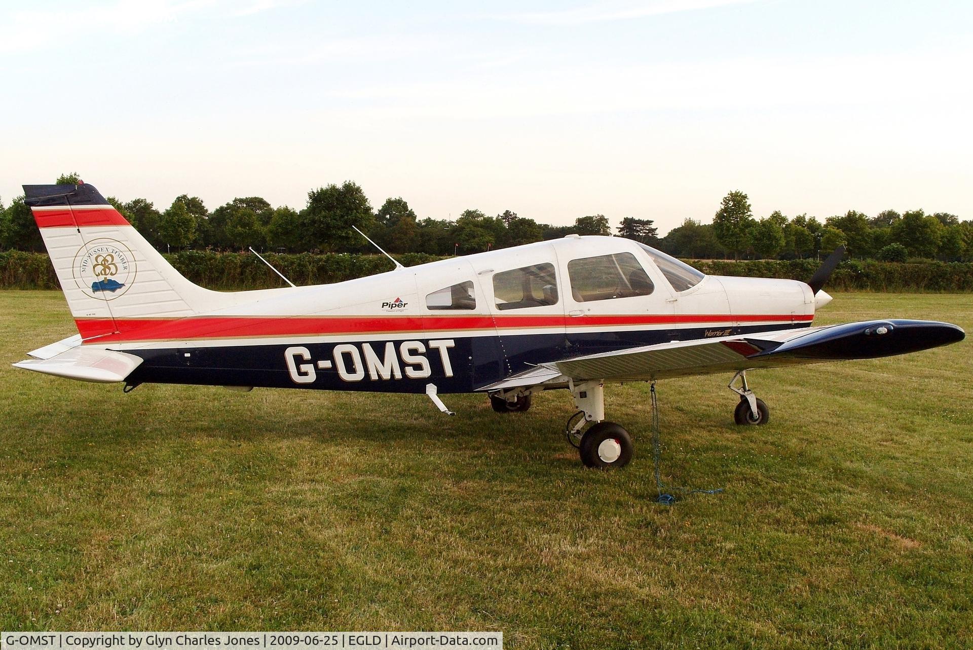 G-OMST, 2001 Piper PA-28-161 Cherokee Warrior III C/N 2842121, Previously G-BZUA and N53363. Owned by Mid-Sussex Timber Co Ltd. With thanks to Denham Control Tower.