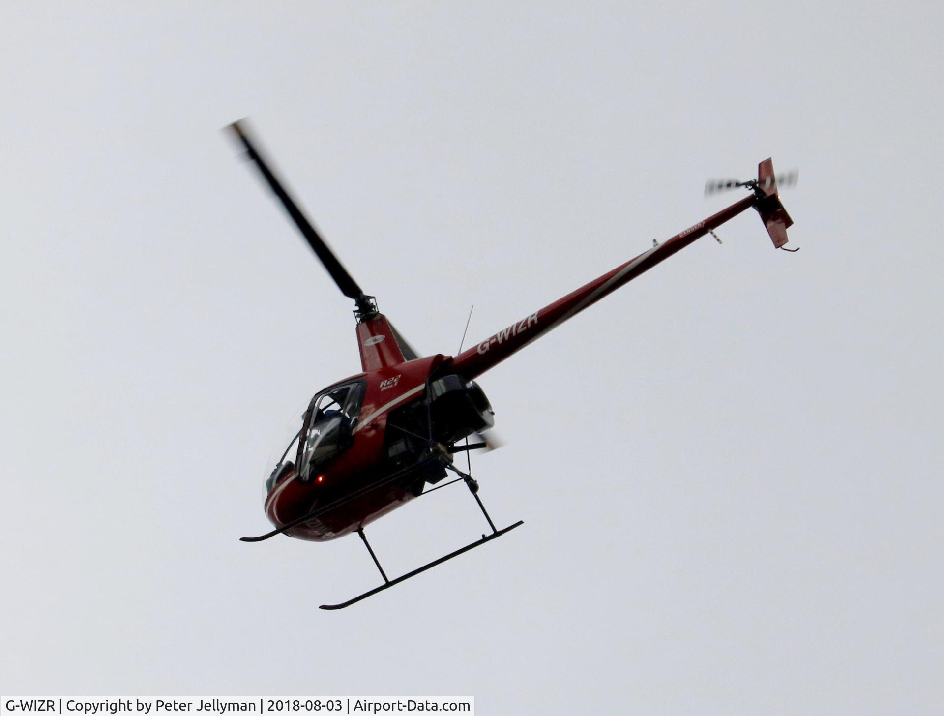 G-WIZR, 1998 Robinson R22 Beta II C/N 2799, Circling over Walsall.