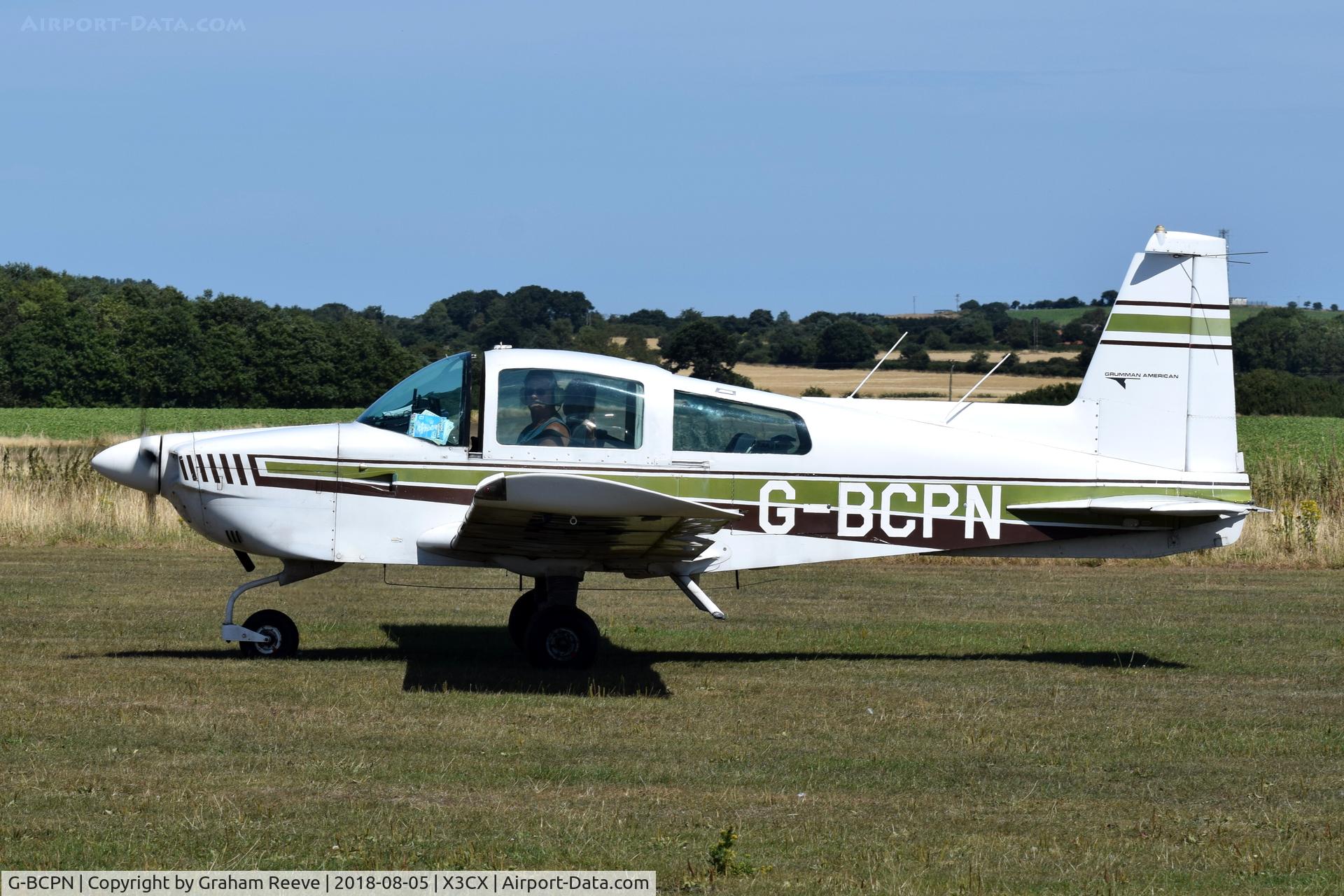 G-BCPN, 1974 Grumman American AA-5 Traveler C/N AA5-0665, Just landed at Northrepps.