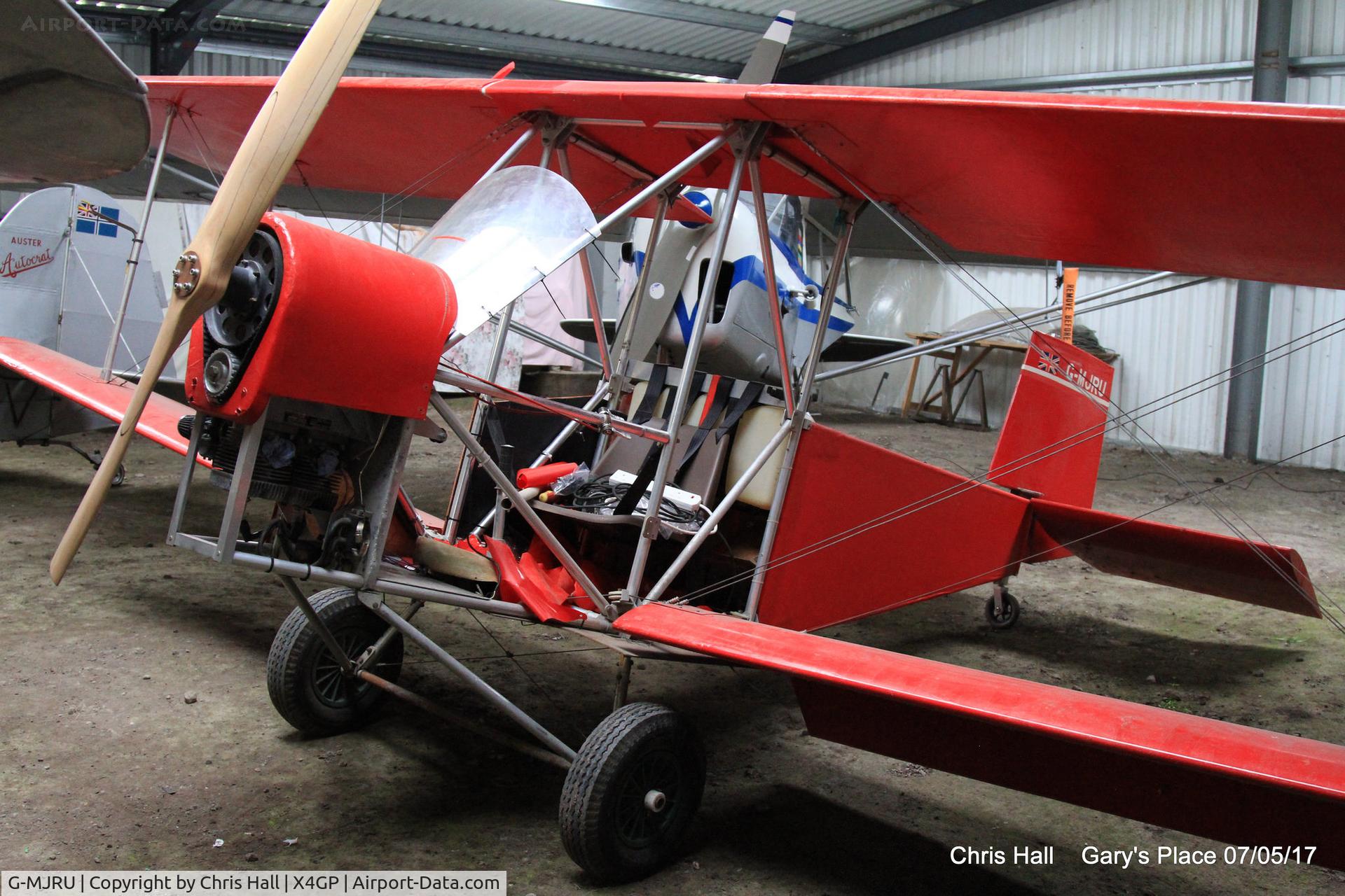 G-MJRU, 1983 Micro Biplane Aviation Tiger Cub 440 C/N SO86, on a private strip in Lincolnshire