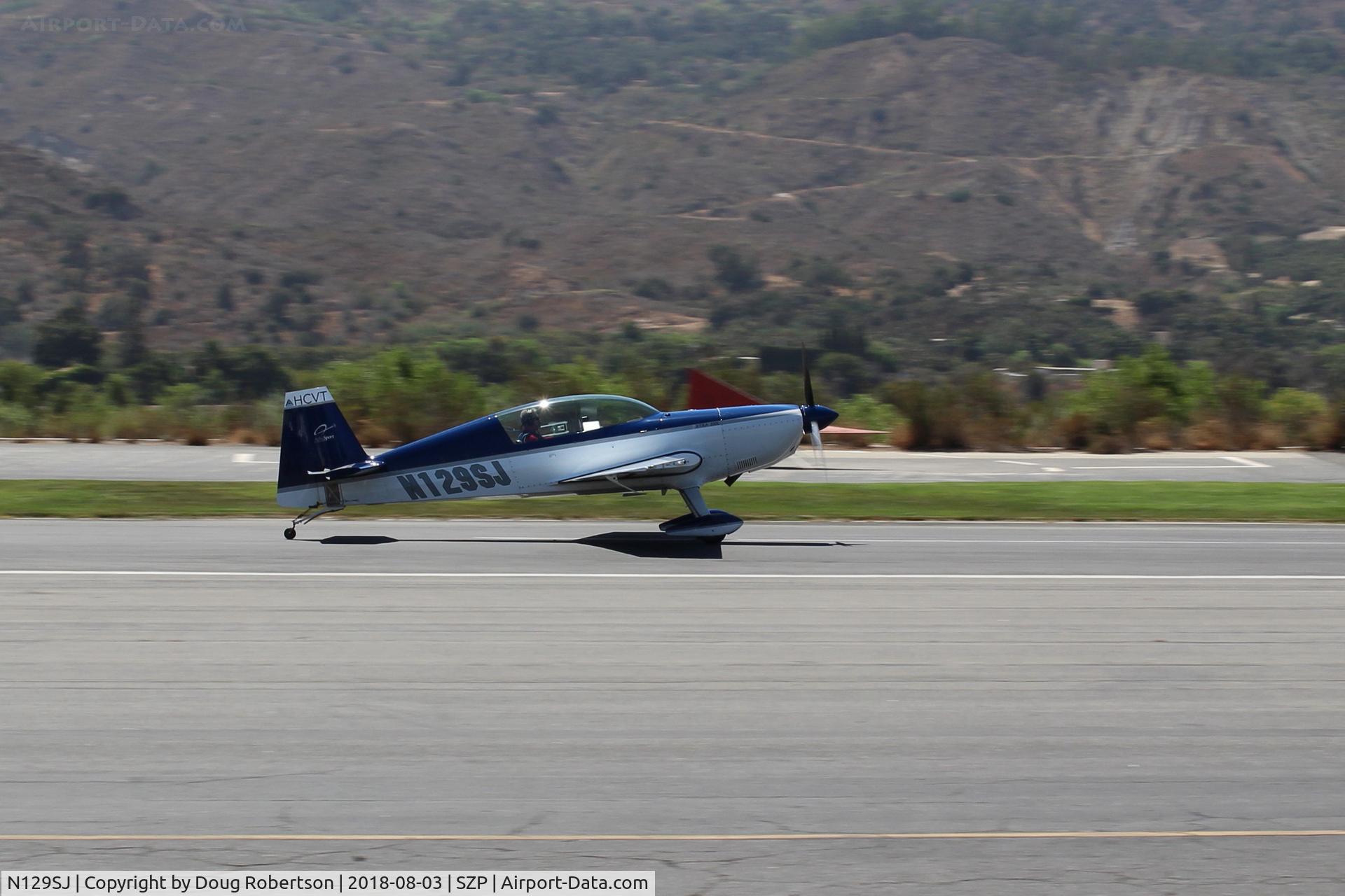 N129SJ, 2001 Extra EA-300L C/N 129, 2001 Extra Flugzeugbau Gmbh EA-300/L. Lycoming AEIO-540 300 Hp, landing roll Rwy 22