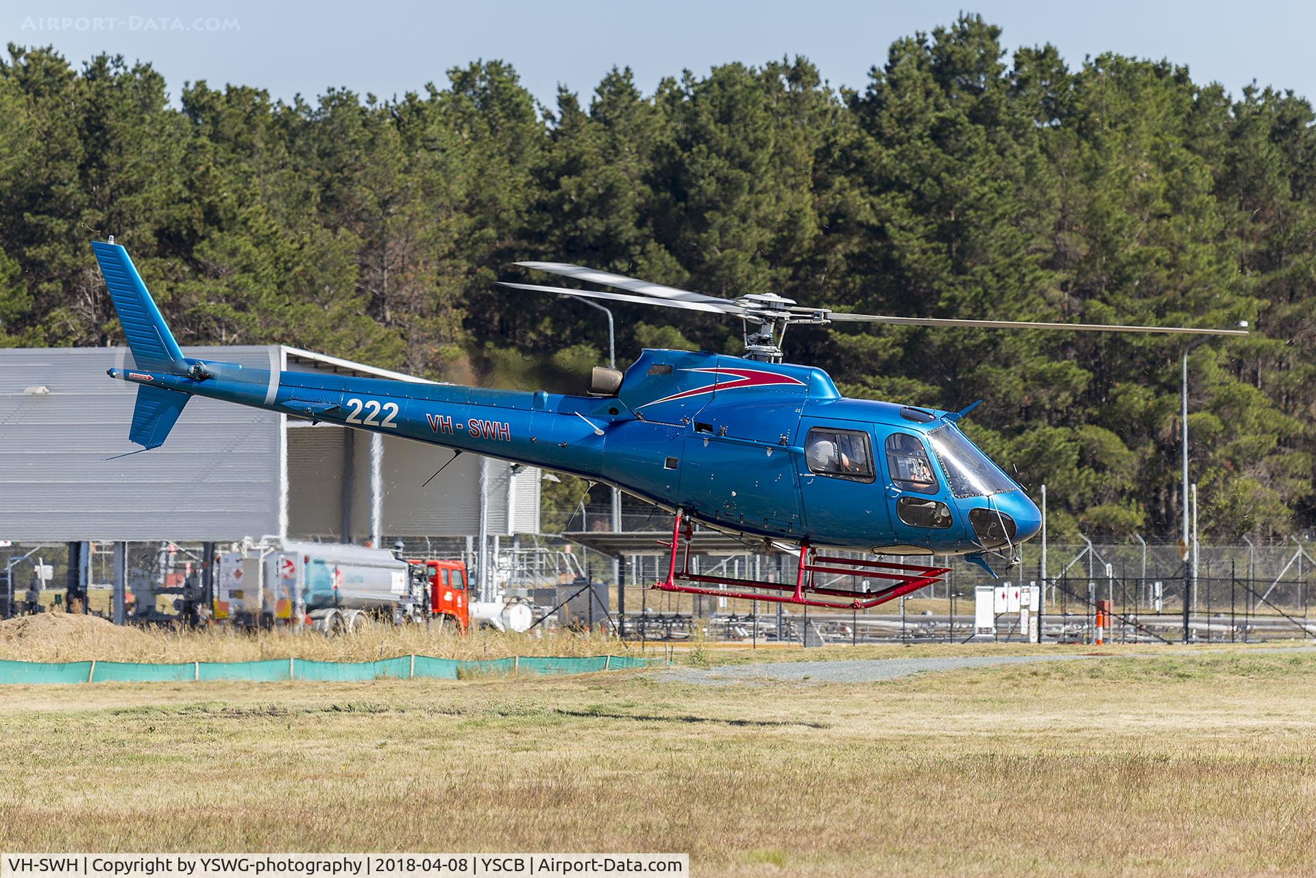 VH-SWH, 1982 Aerospatiale AS-350BA Ecureuil C/N 1676, Ae?rospatiale AS 350BA Ecureuil (VH-SWH) operating joy flights at the 2018 Canberra Airport open day.