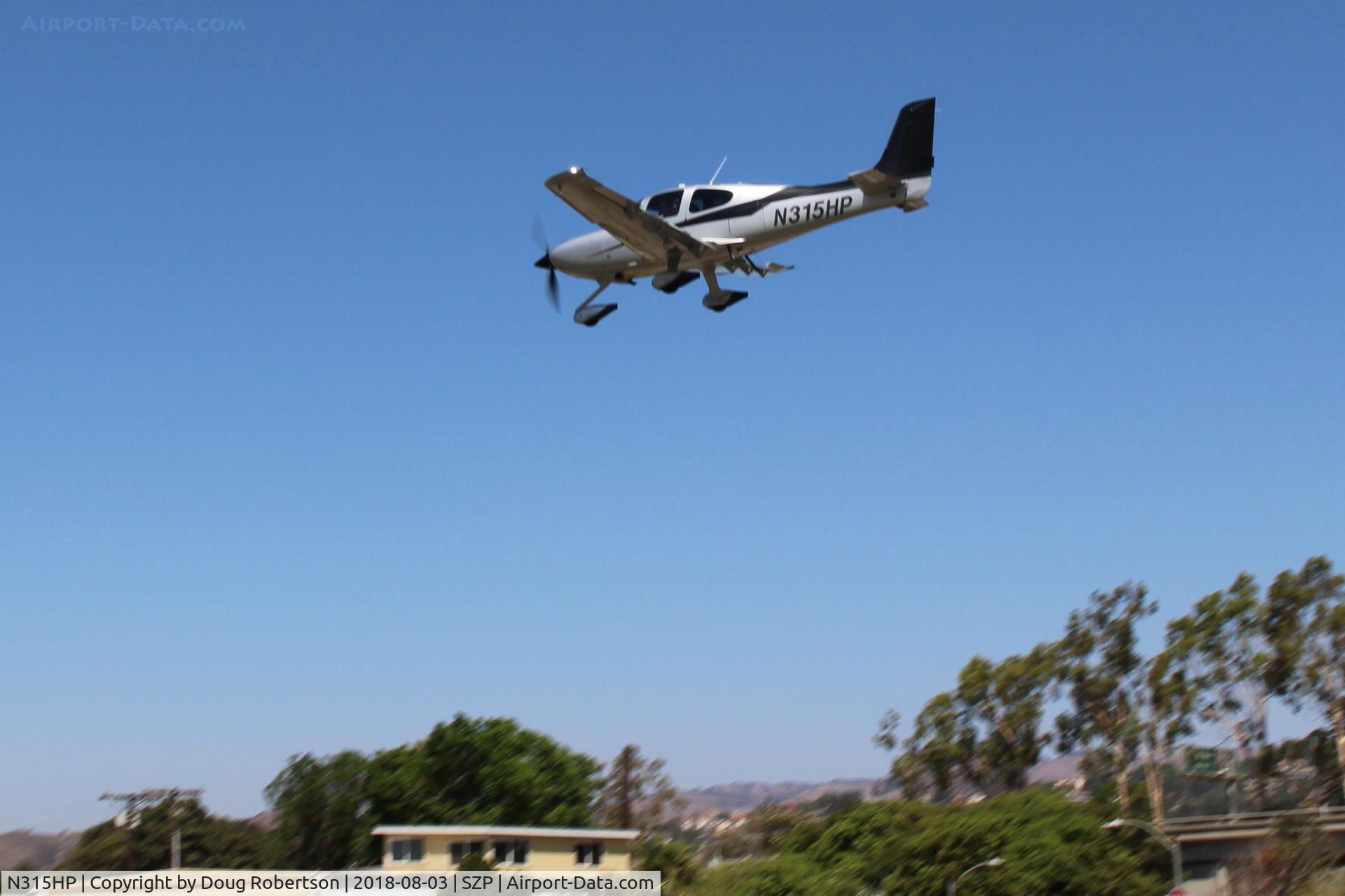 N315HP, 2015 Cirrus SR22T C/N 1014, 2015 Cirrus SR22T, on short final for Rwy 22