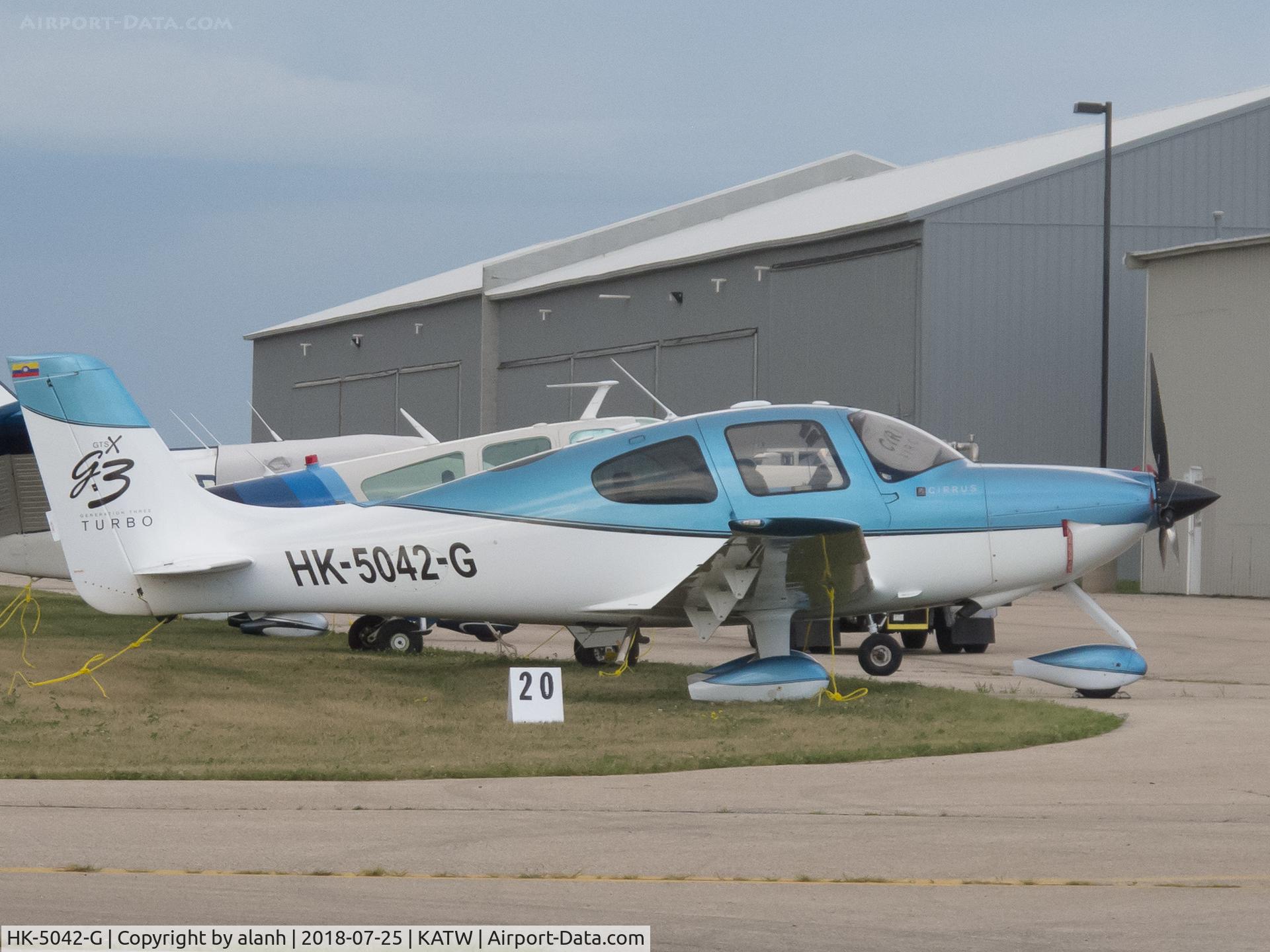 HK-5042-G, 2007 Cirrus SR22 G3X C/N 2618, Parked at Appleton for AirVenture 2018