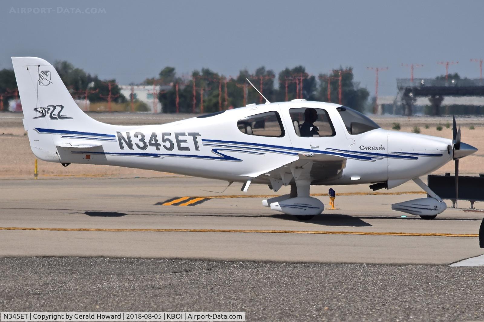 N345ET, 2003 Cirrus SR22 C/N 0492, Taxiing onto the north GA ramp.