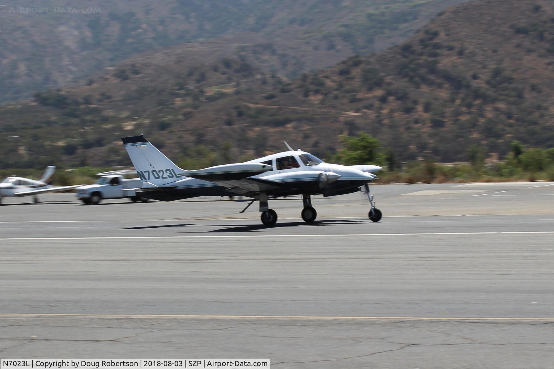 N7023L, 1966 Cessna 310K C/N 310K0123, 1966 Cessna 310k, two Continental IO-470s, 260 Hp each, takeoff roll Rwy 22