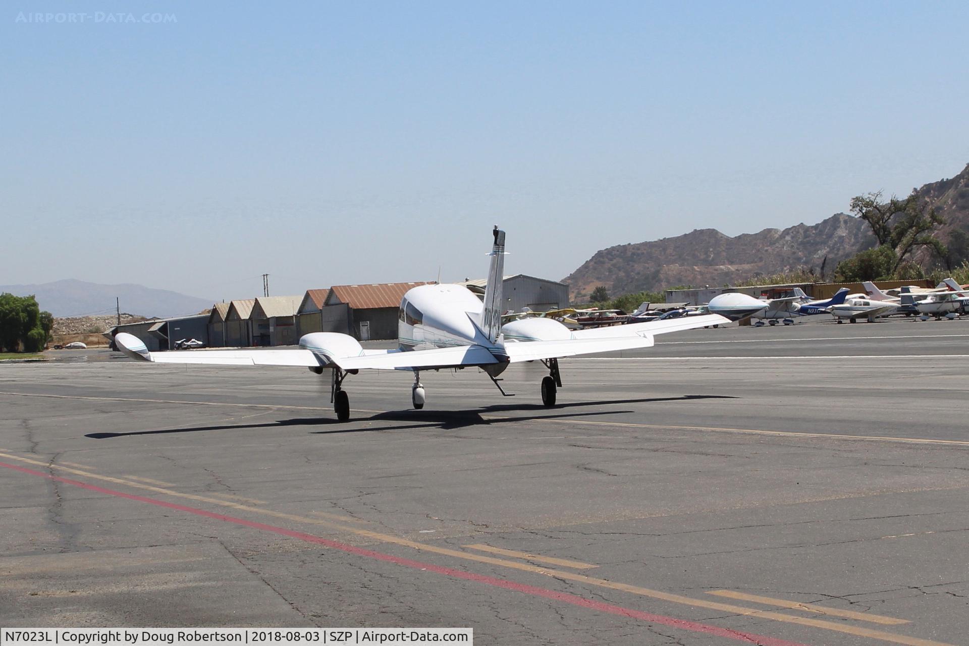 N7023L, 1966 Cessna 310K C/N 310K0123, 1966 Cessna 310K, two Continental IO-470s 260 Hp each, taxi to Runway 22