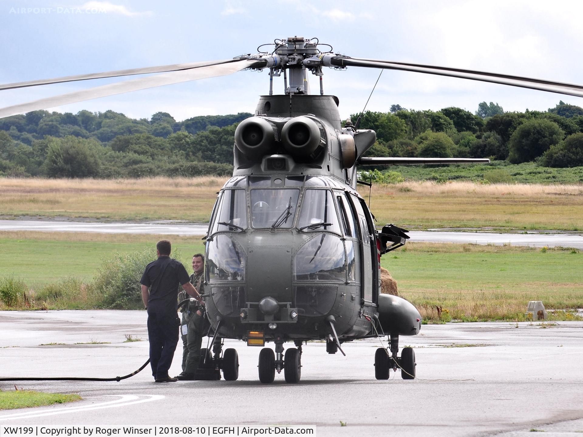 XW199, 1971 Westland Puma HC.1 C/N 1042/F9746, RAF Puma HC.2 helicopter taking on fuel.