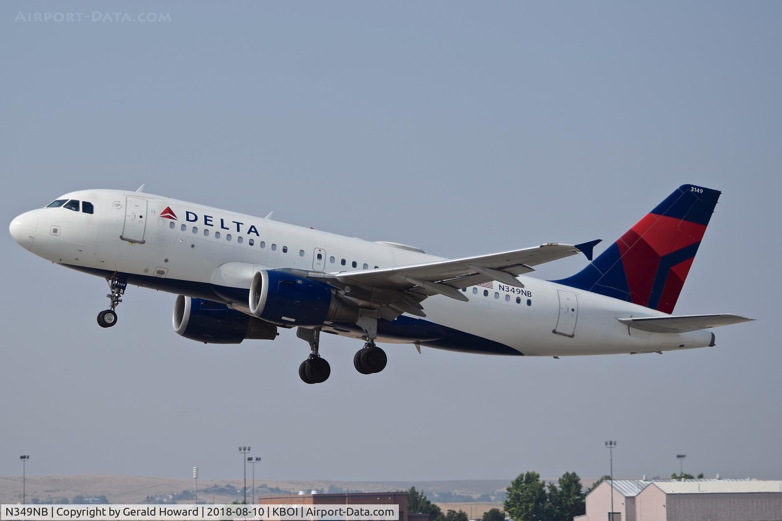 N349NB, 2002 Airbus A319-114 C/N 1815, Climb out from RWY 10L.