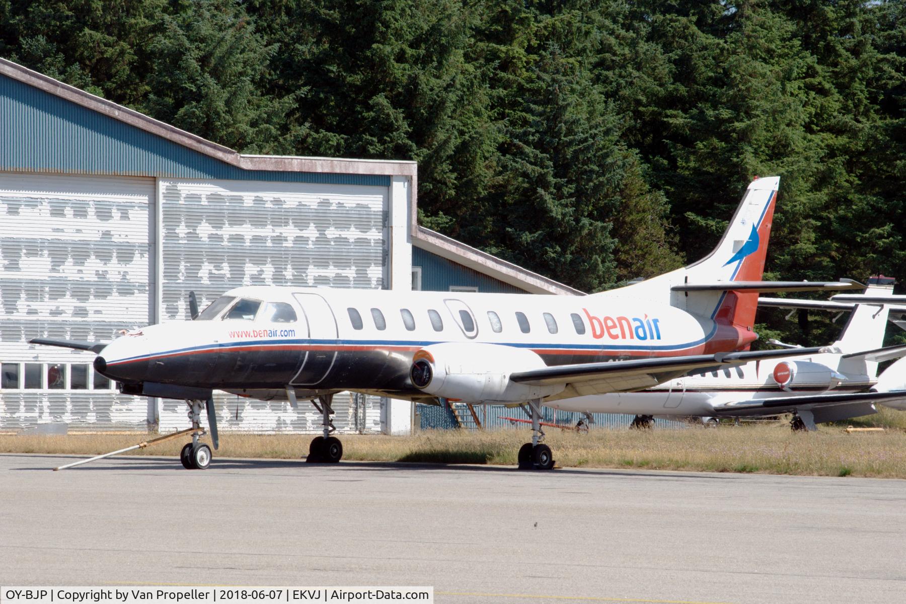 OY-BJP, 1982 Fairchild SA-227AC Metro III C/N AC-499, BenAir Metro III parked at Stauning airport, Denmark. For sale at the time, and missing a propeller