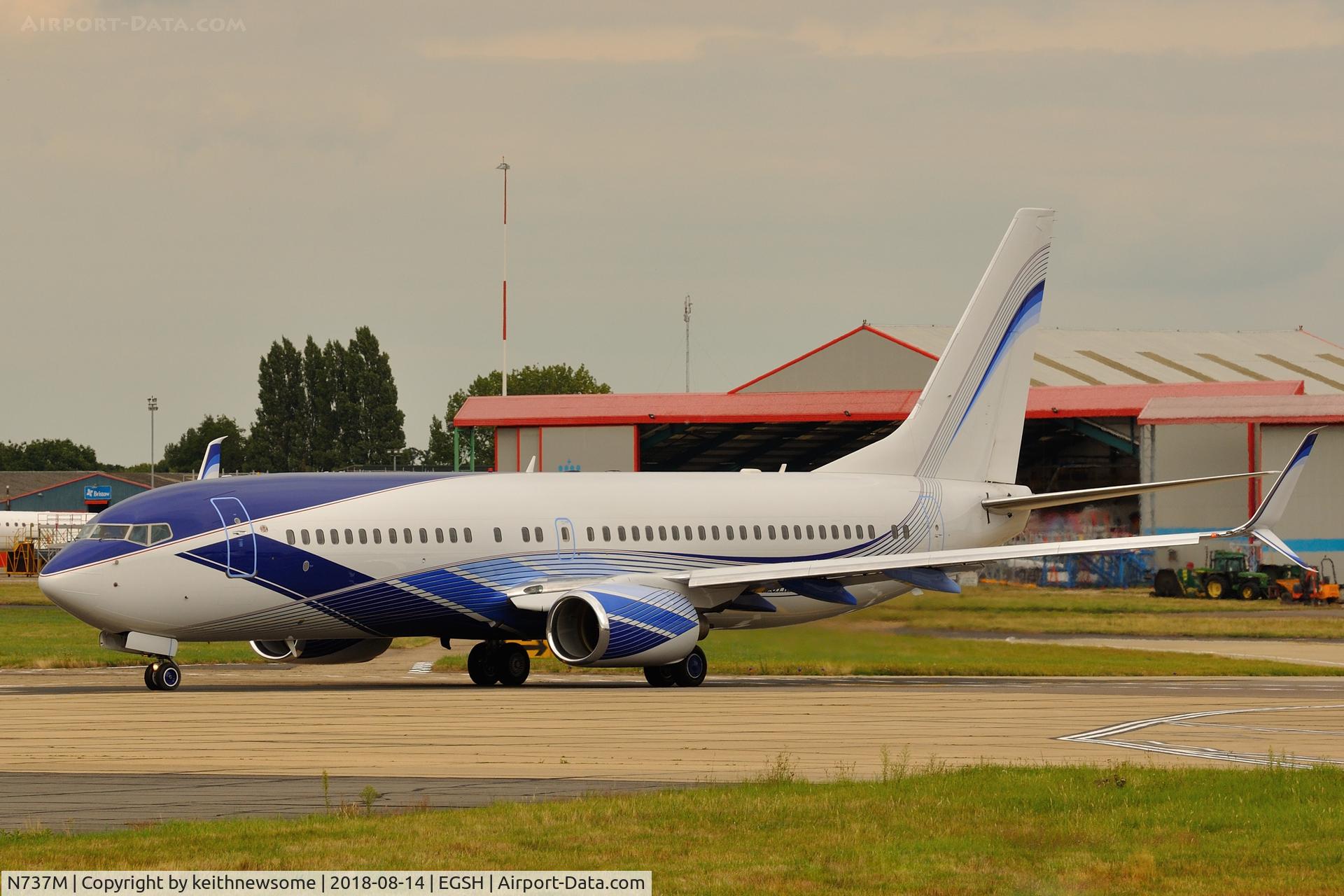 N737M, 2002 Boeing 737-8EQ BBJ C/N 33361, Leaving Norwich.