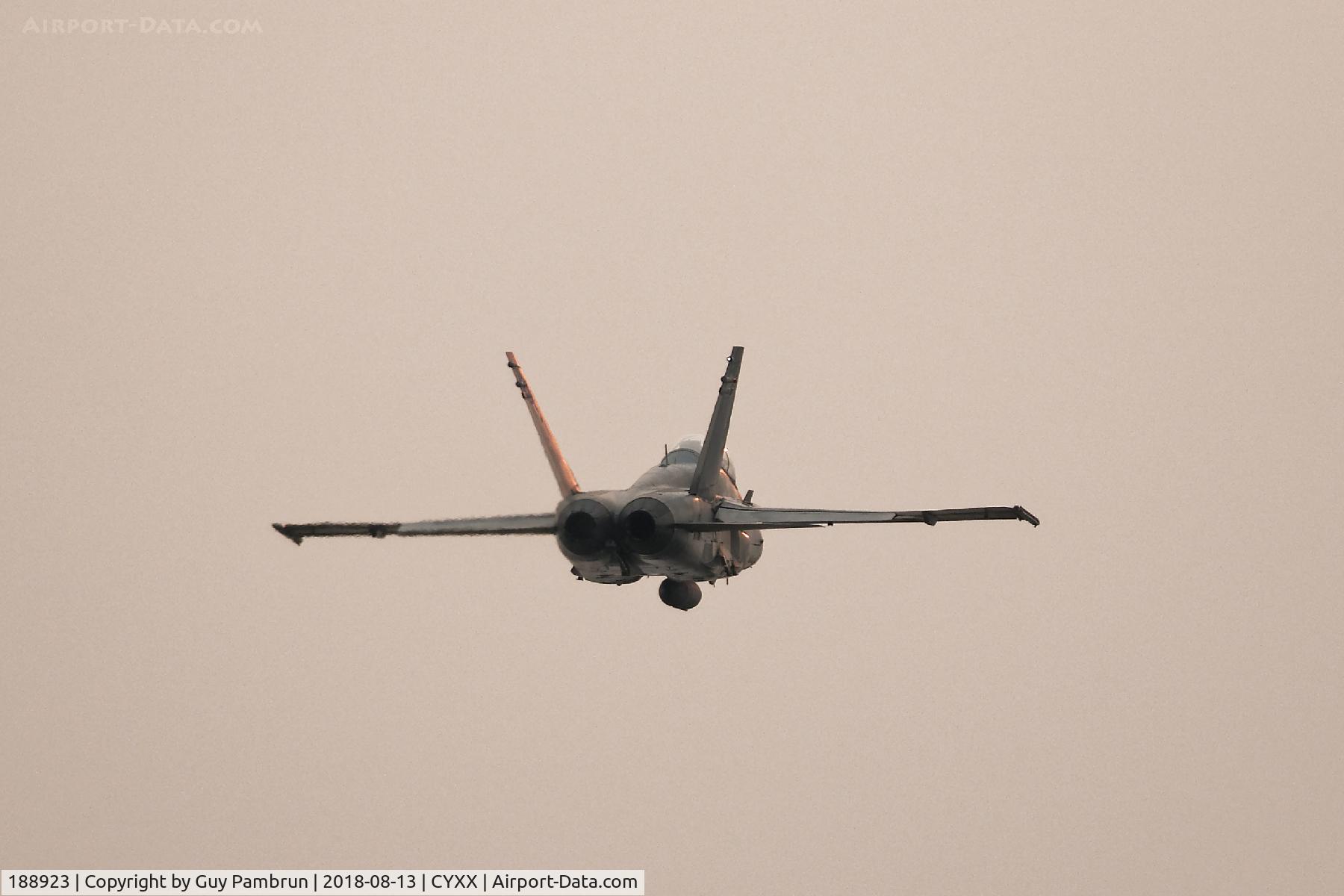 188923, 1986 McDonnell Douglas CF-188B Hornet C/N 0445/B080, Departing into the sun from CYXX on a smokey foggy morning.