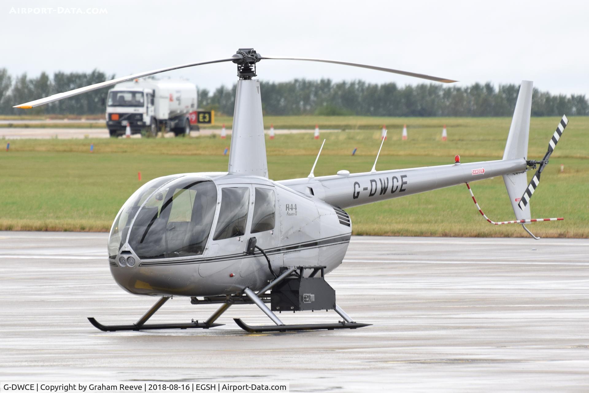 G-DWCE, 2006 Robinson R44 Raven II C/N 11511, Parked at Norwich.