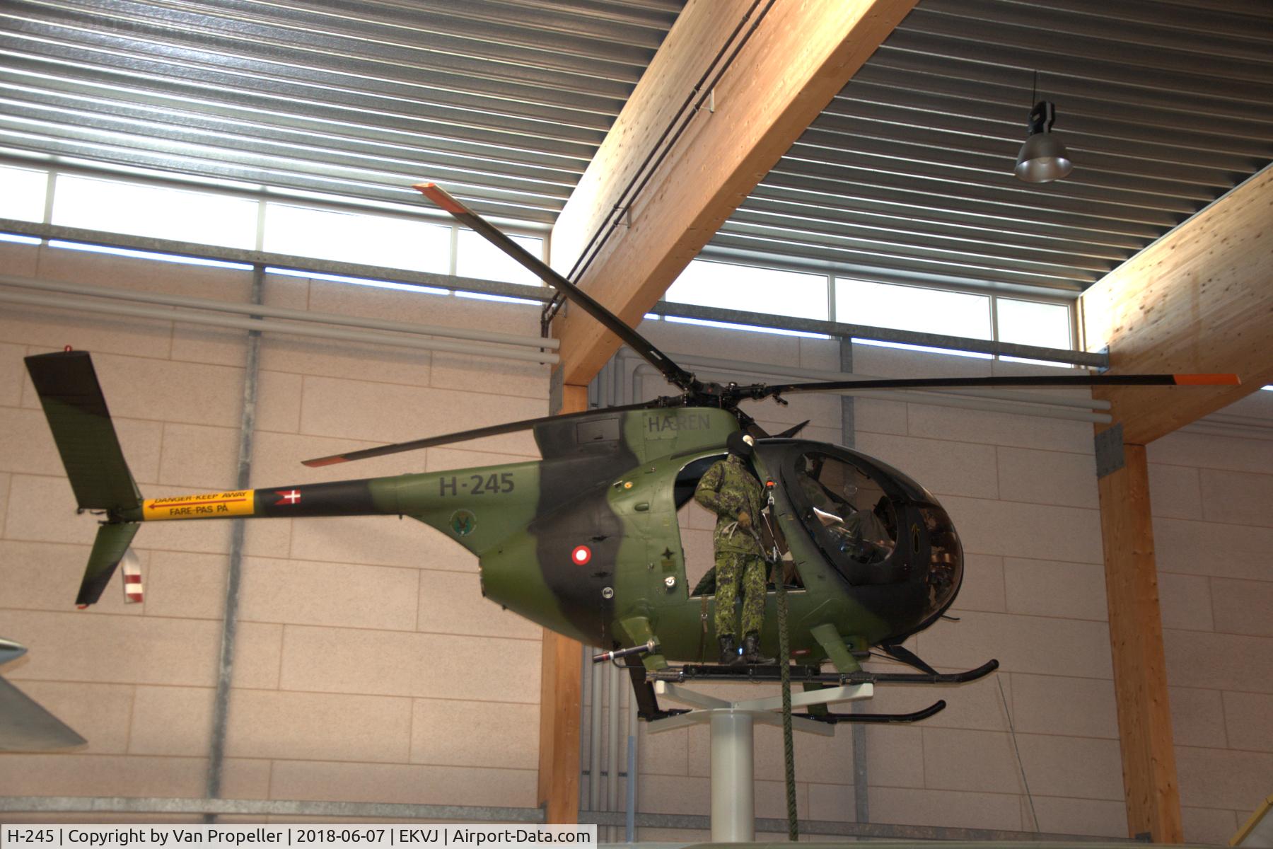 H-245, 1974 Hughes 500M C/N 24-0245M, Hughes 500M Cayuse of the Danish Army shown on a pole in Danmarks Flymuseum at Stauning airport