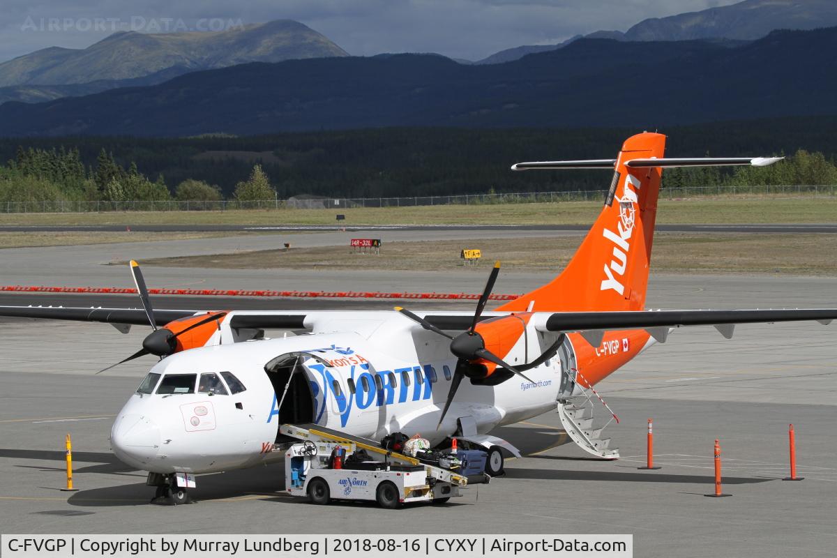 C-FVGP, 1989 ATR 42-300 C/N 143, In the ramp loading baggage at Whitehorse, YUkon