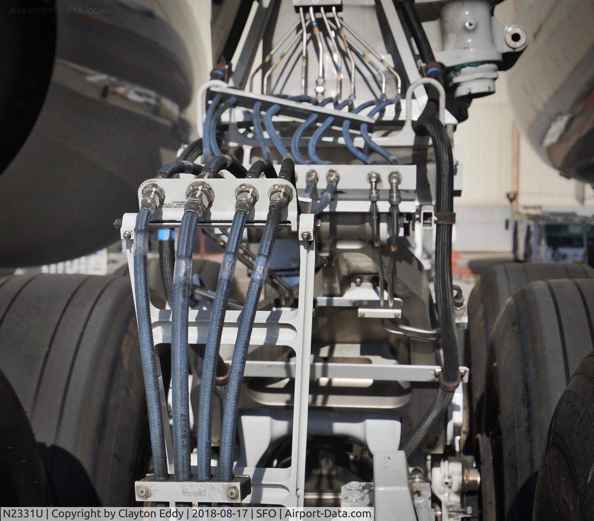 N2331U, 2016 Boeing 777-322/ER C/N 62642, Main landing gear. SFO 2018.