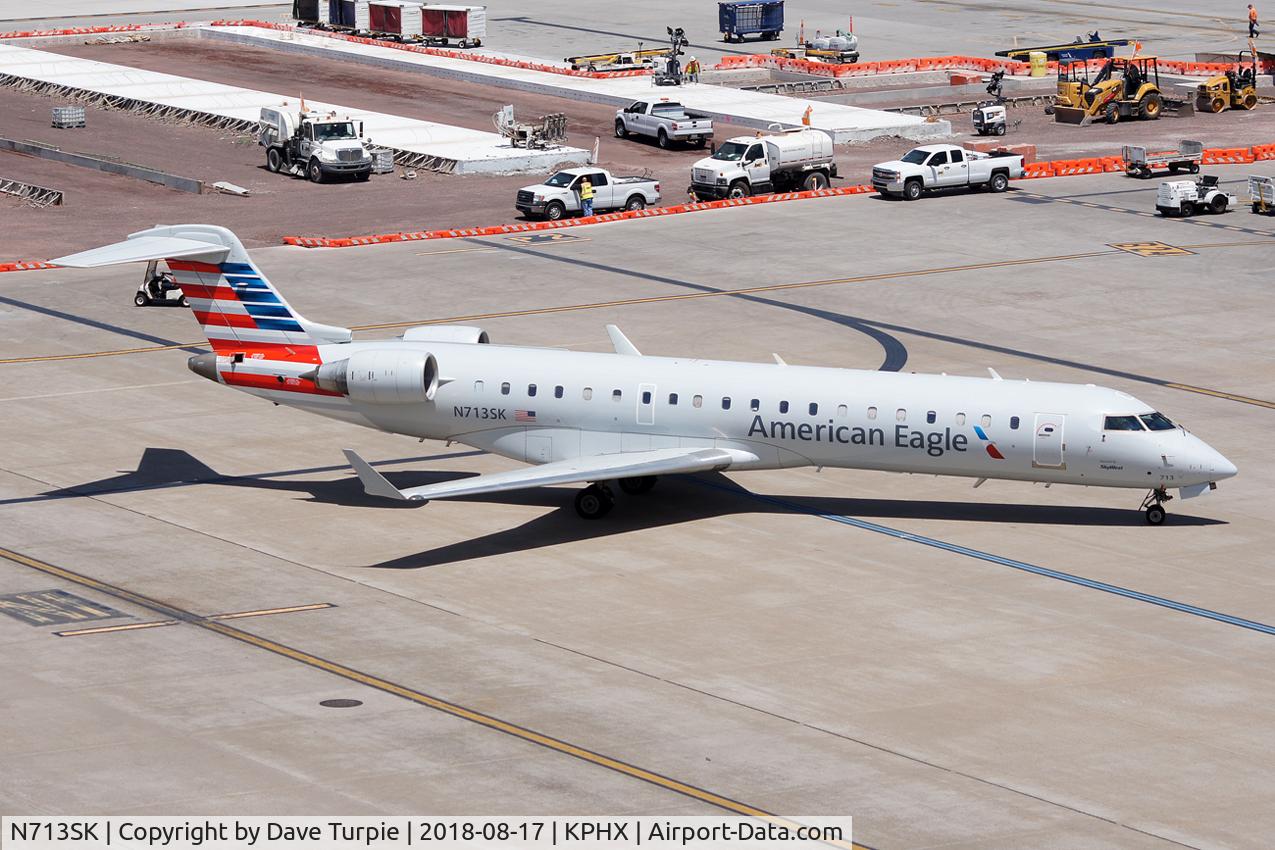 N713SK, 2004 Bombardier CRJ-701ER (CL-600-2C10) Regional Jet C/N 10174, No comment.