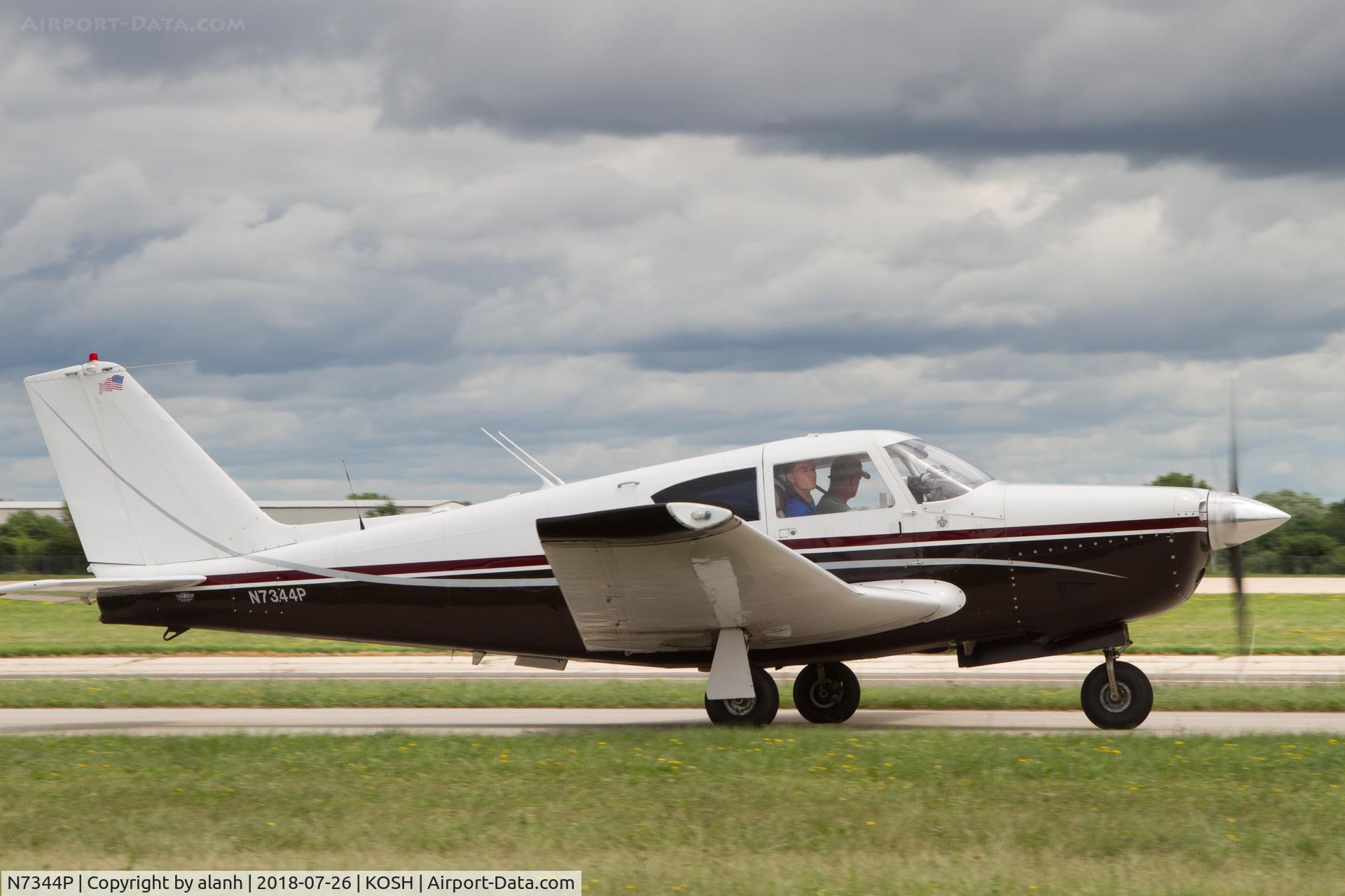N7344P, 1961 Piper PA-24-250 Comanche C/N 24-2522, Taxiing for departure, AirVenture 2018
