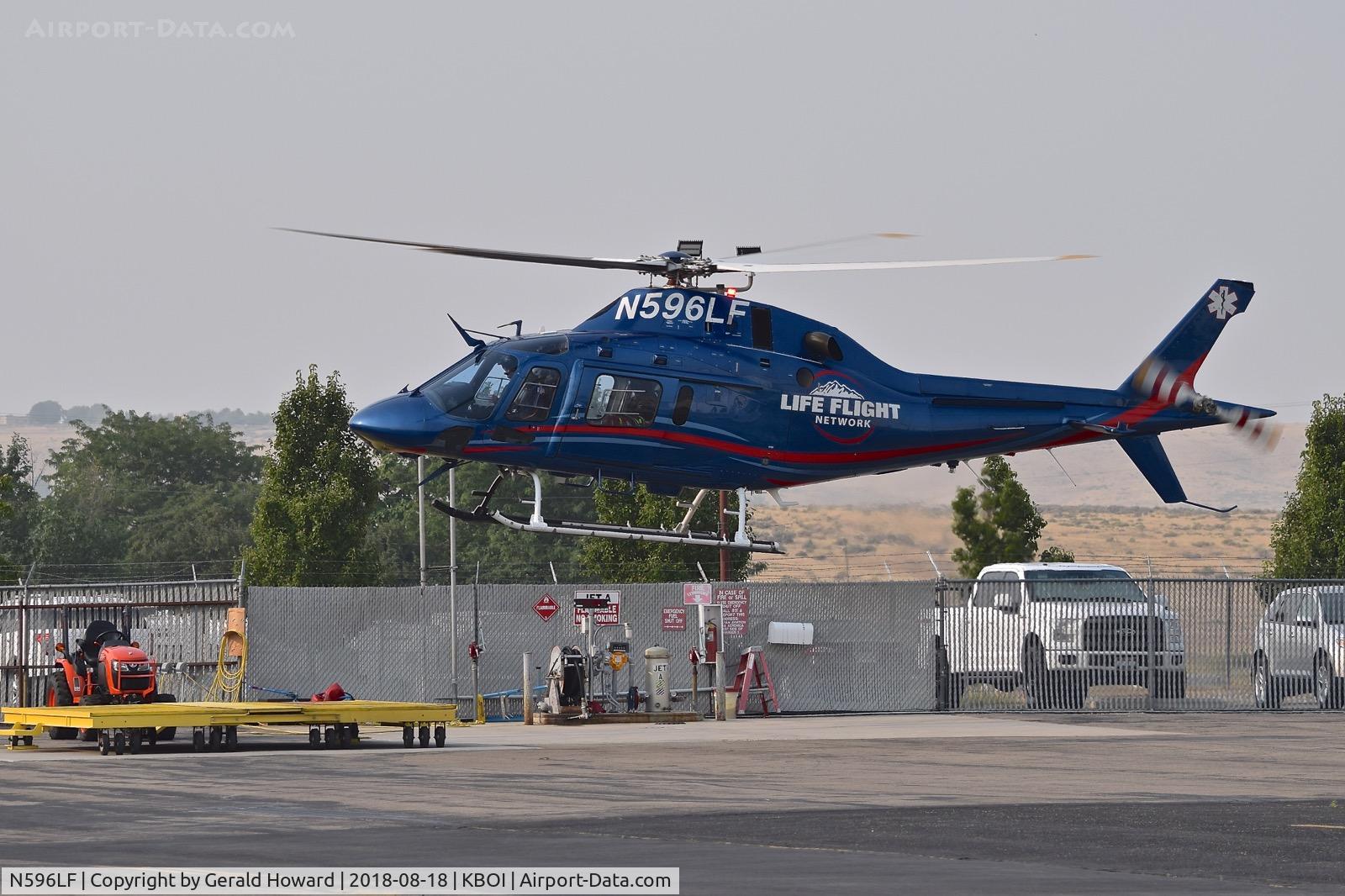 N596LF, 2013 AgustaWestland AW119 MkII C/N 14810, Lifting off from Life Flight ramp.