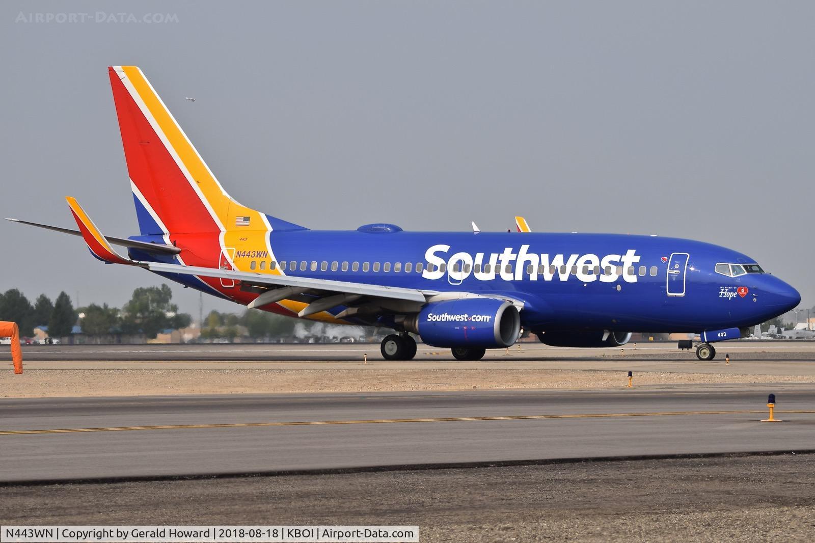 N443WN, 2003 Boeing 737-7H4 C/N 29838, Taxiing from RWY 10L on Delta for the ramp.
