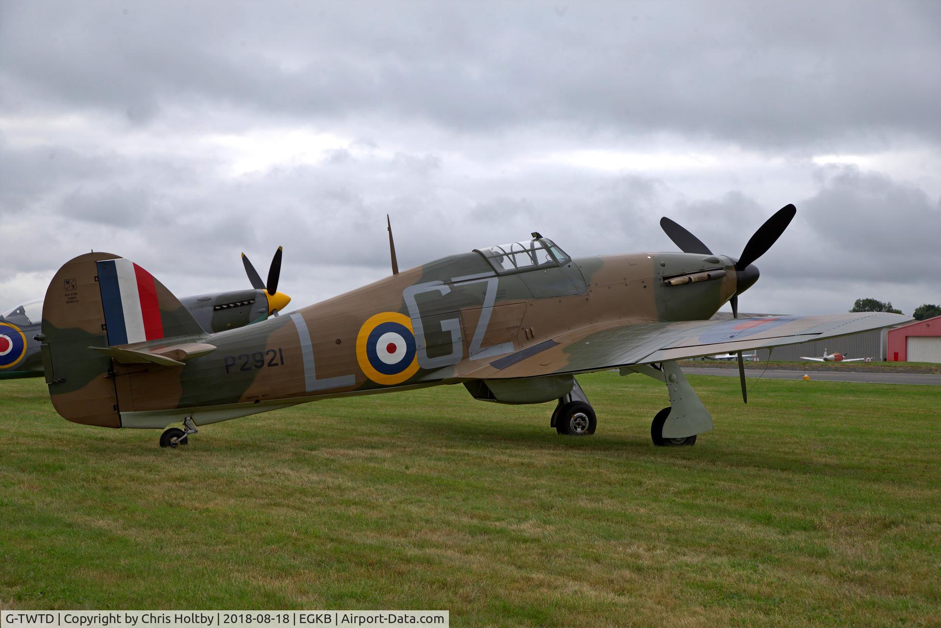 G-TWTD, 1940 Hawker (CCF) Sea Hurricane Mk10 C/N CCF/41H/8020, Currently painted to represent Hurricane Mk.I P2921 ‘Blue Peter’ flown by Pete Brothers of 32 Squadron, Biggin Hill 1940 (echoed by replica at old gates). At Festival of Flight Biggin Hill 2018