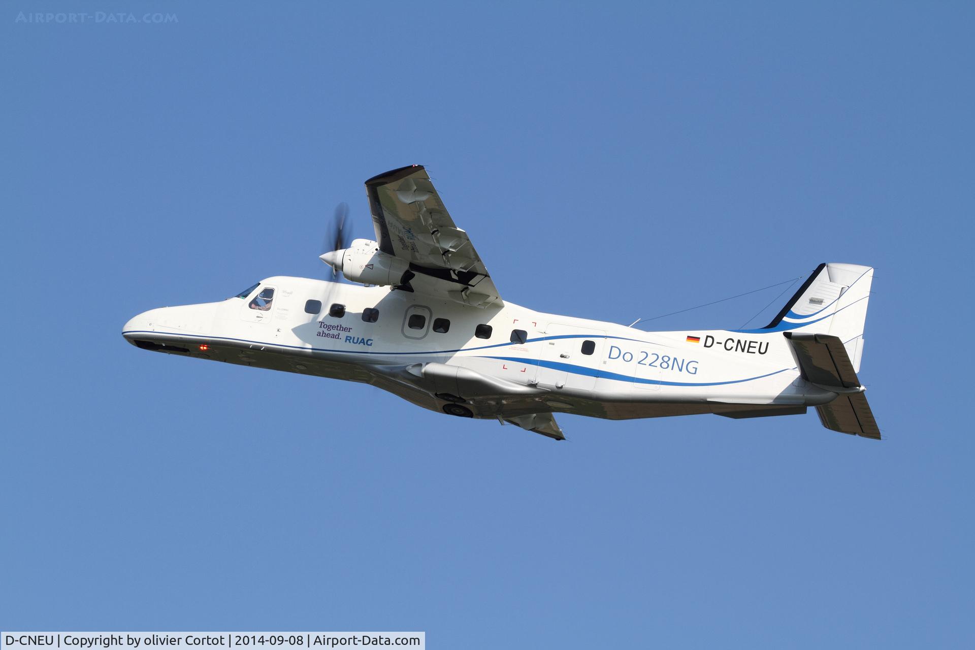 D-CNEU, 1992 Dornier 228-212 C/N 8206, leaving Payerne