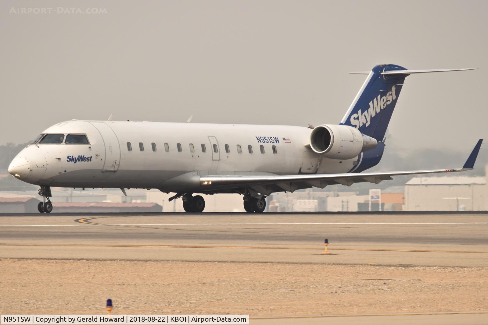 N951SW, 2003 Bombardier CRJ-200LR (CL-600-2B19) C/N 7795, Starting take off run on RWY 10L.