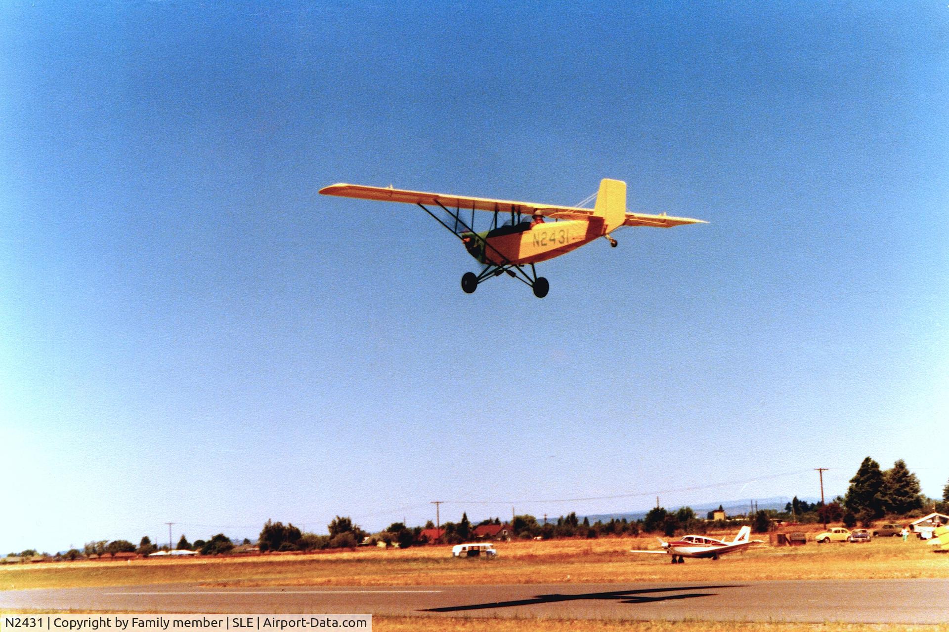 N2431, 1976 Pietenpol Air Camper C/N JNP-1, Built by John L. Newberry, retired, Captain, United States Air Force. He was a master wood craftsman & built this airplane from scratch from original plans. This was a nine year hobby project. First flight was October 23, 1976.