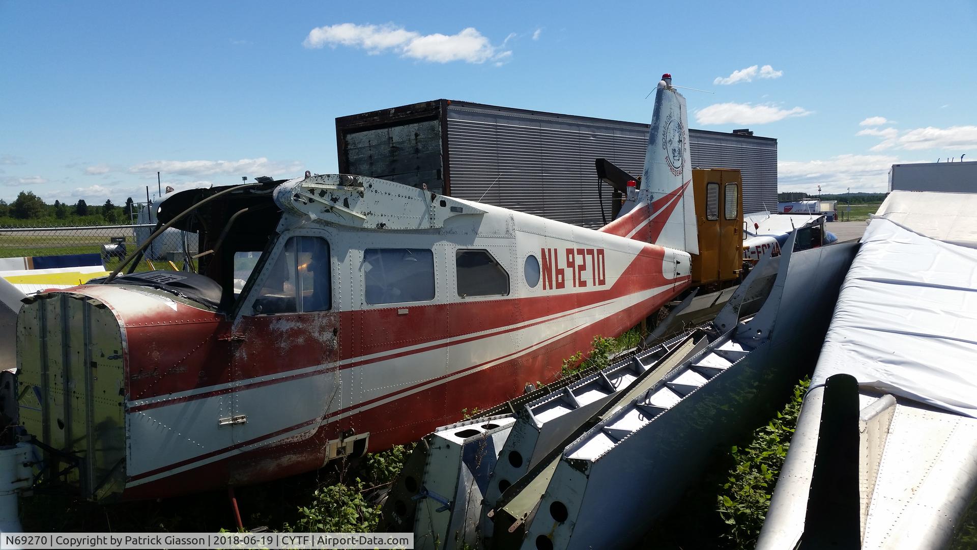 N69270, 1970 Aermacchi AL 60-B2 C/N 906270, In a sad shape behind a hangar. It's been like this for a few years.