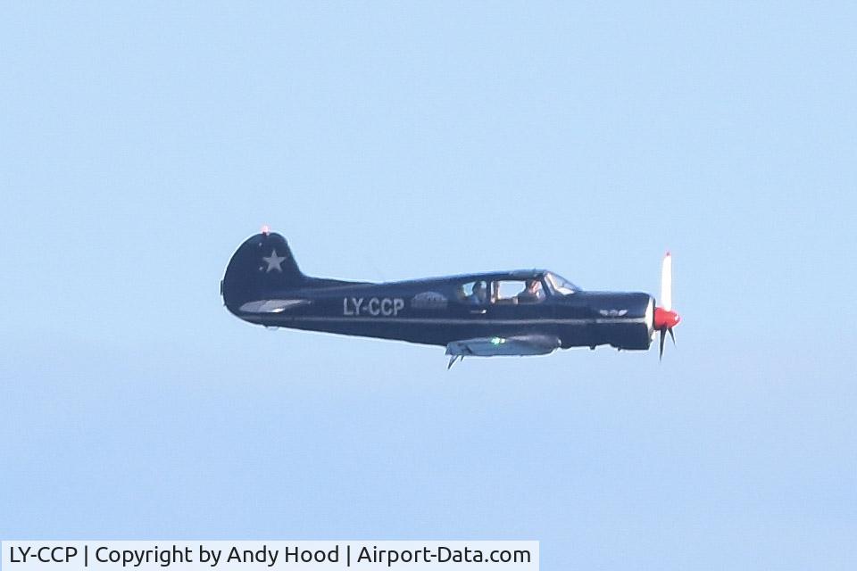LY-CCP, 1981 Yakovlev Yak-18T C/N 22202044623, Flying over Flamborough Head. East Yorkshire.  UK