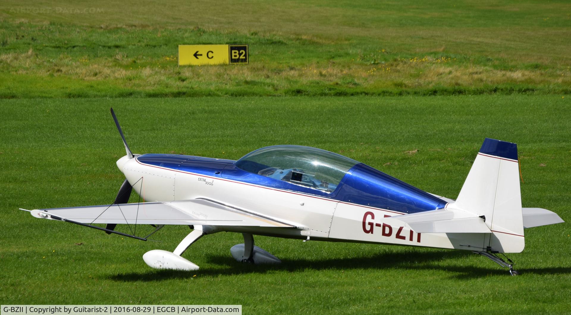 G-BZII, 1999 Extra EA-300L C/N 119, At City Airport Manchester