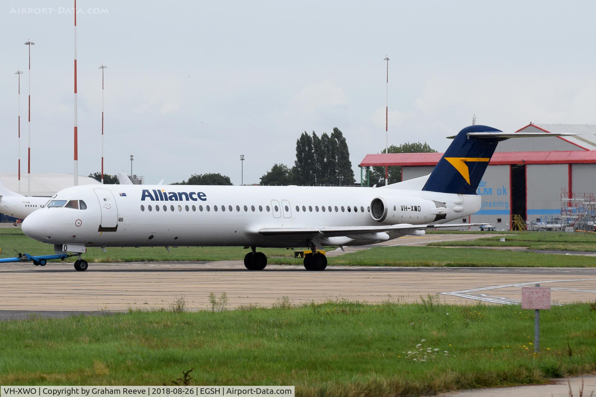VH-XWO, 1989 Fokker 100 (F-28-0100) C/N 11280, Under tow at Norwich.