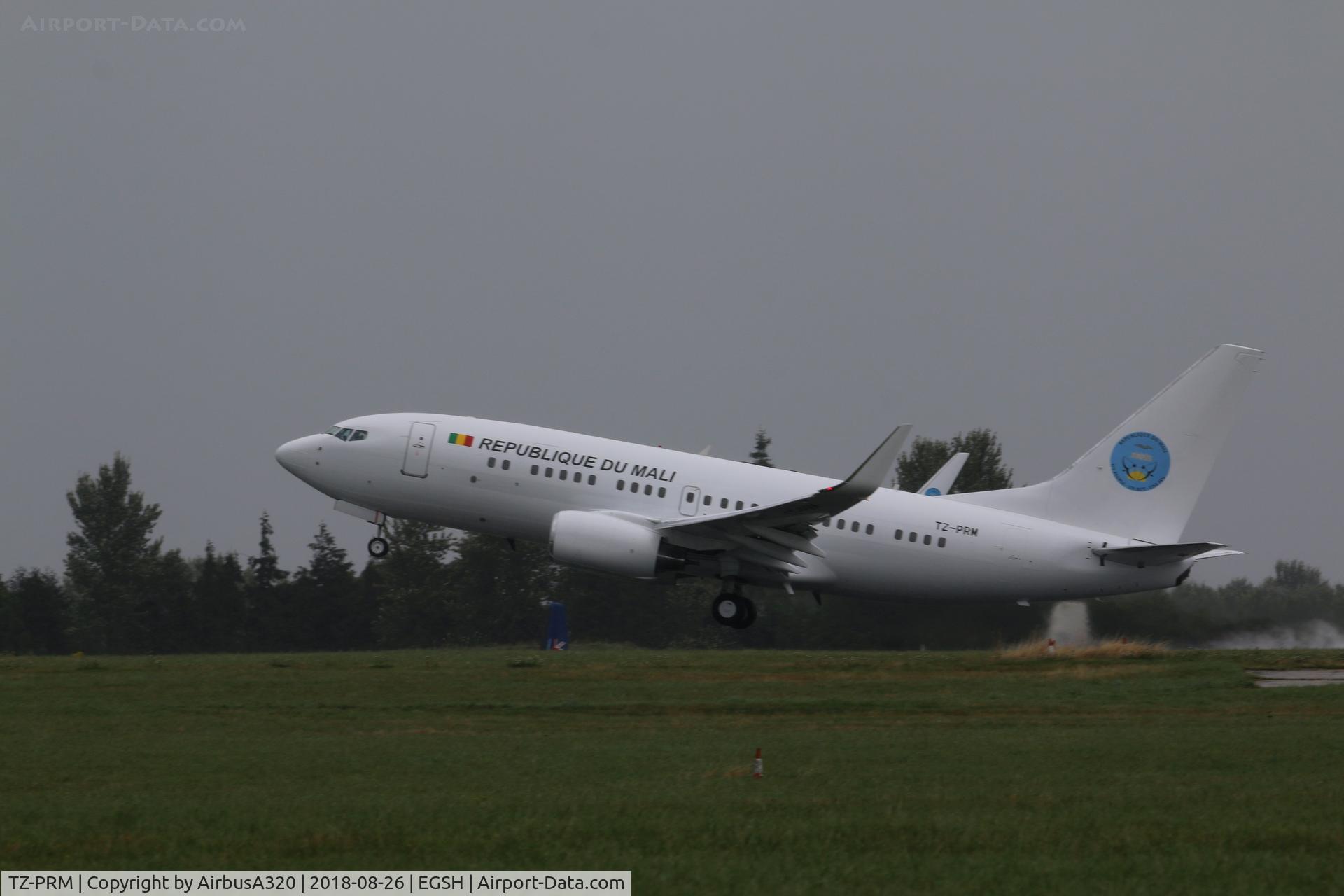 TZ-PRM, 1999 Boeing 737-7BC C/N 30328, Departing a wet NWI