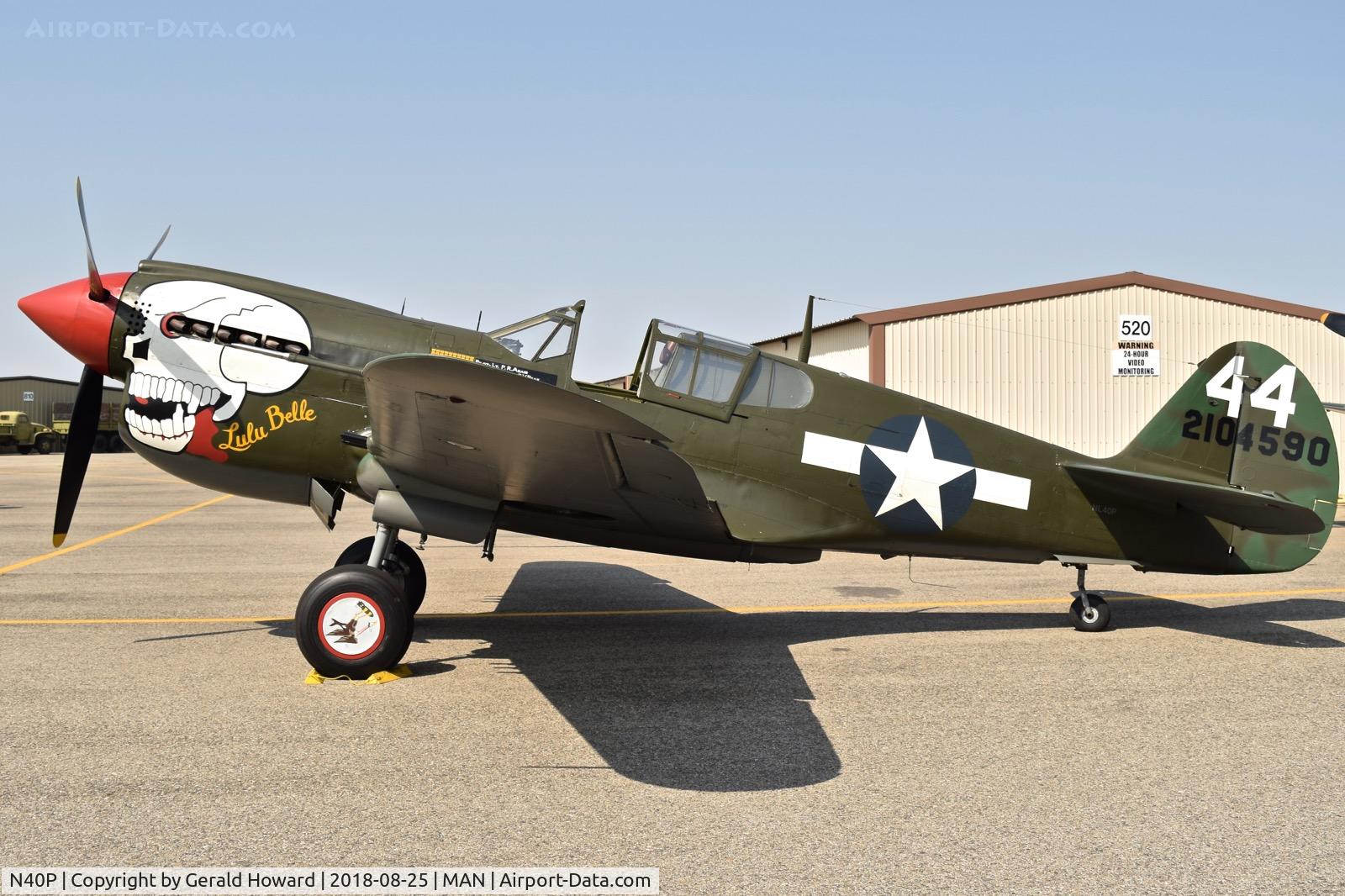 N40P, 1943 Curtis Wright P-40N C/N 42-104640, Parked on airshow ramp.