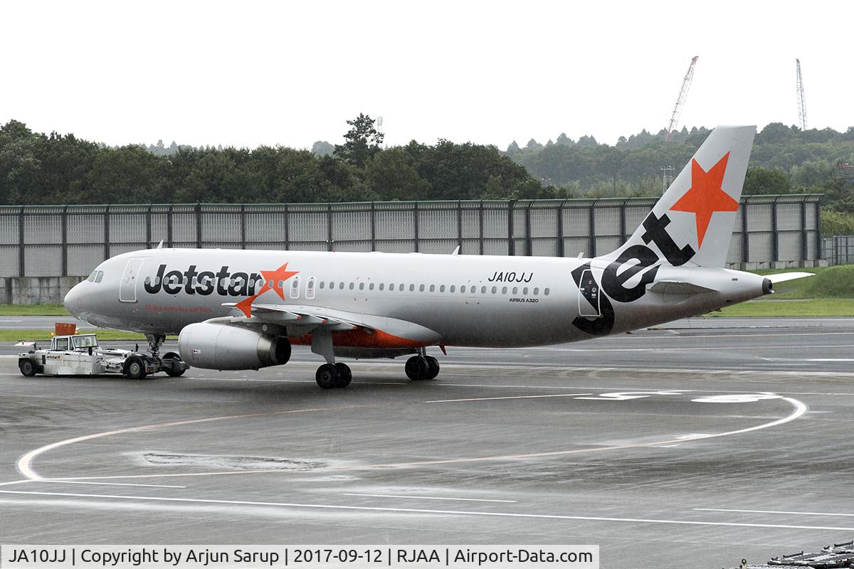 JA10JJ, 2013 Airbus A320-232 C/N 5520, Pushback at Narita in the rain.
