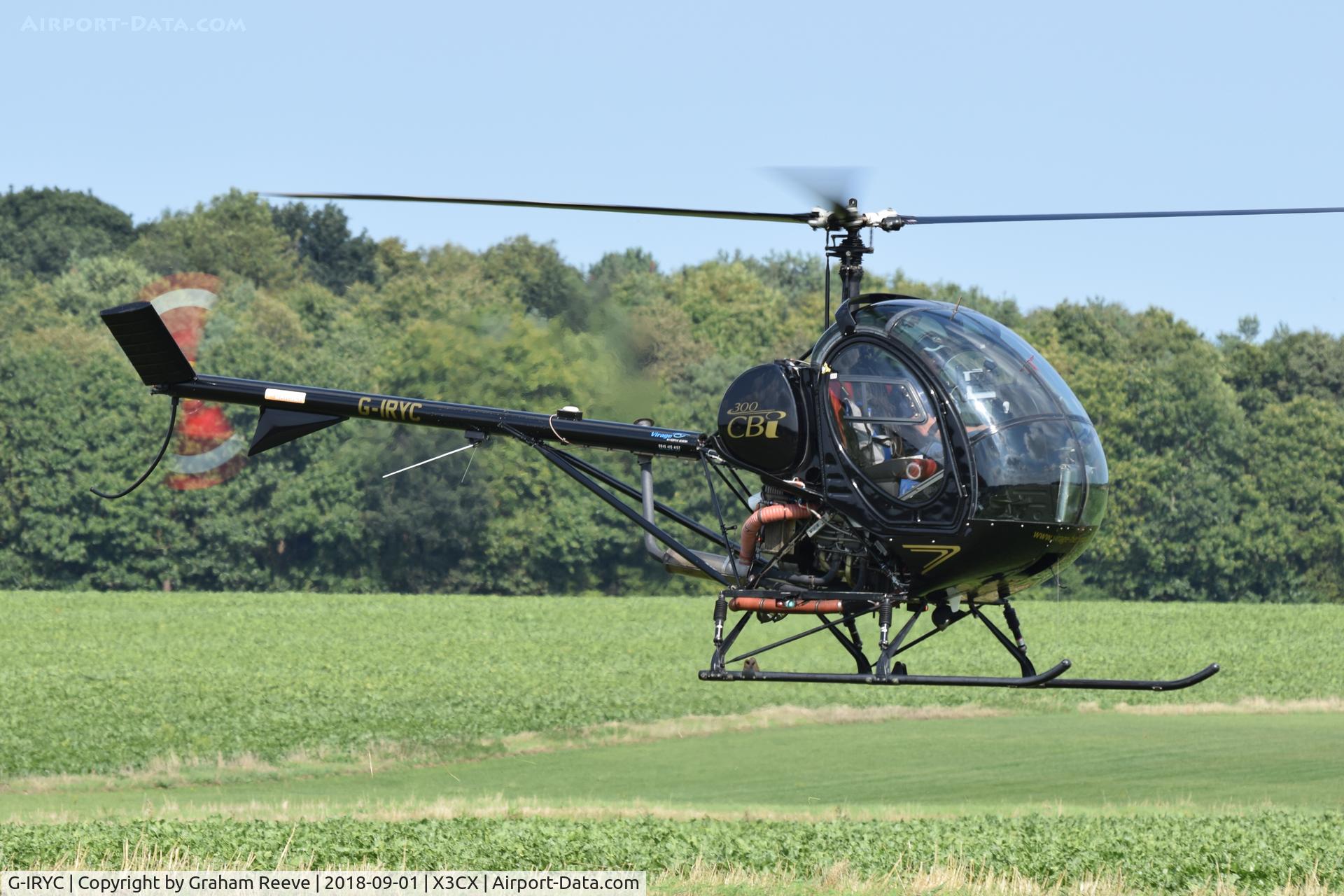 G-IRYC, 2004 Schweizer 269C-1 C/N 0194, Landing at Northrepps.