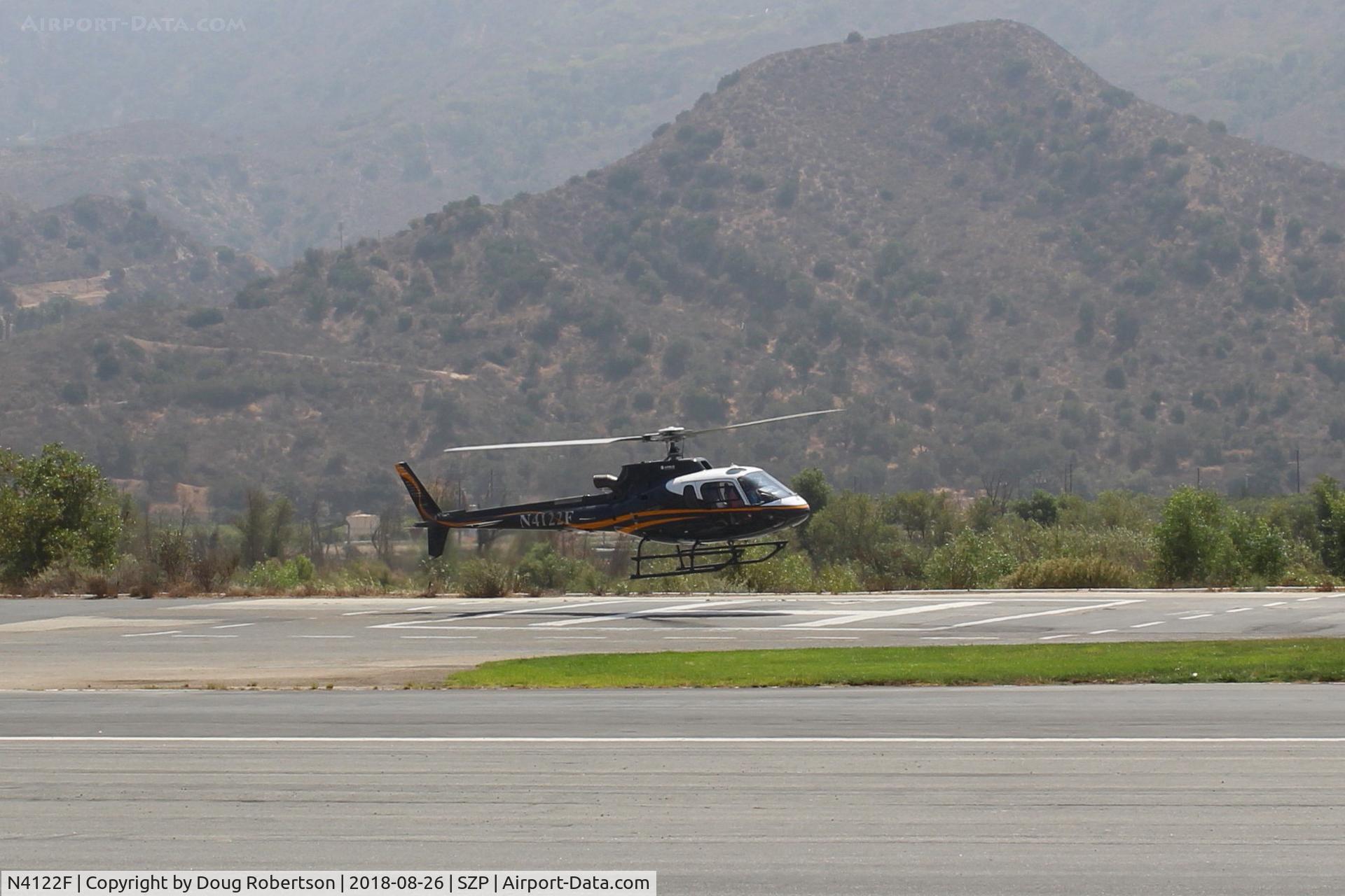 N4122F, 2010 Eurocopter AS-350B-3 Ecureuil Ecureuil C/N 4932, 2010 Eurocopter AS350-B3 ECUREIL, one Turbomeca Arriel 2B1 Turbo-shaft 750 SHp, landing on SZP Helipad, almost immediate fast departure