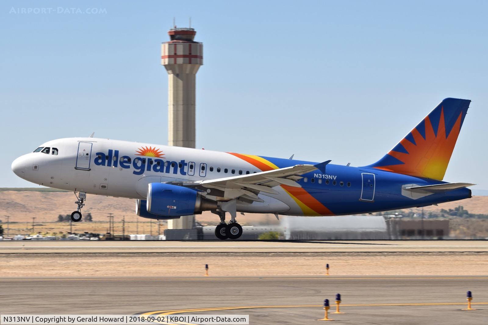 N313NV, 2004 Airbus A319-111 C/N 2300, Take off from RWY 10L.