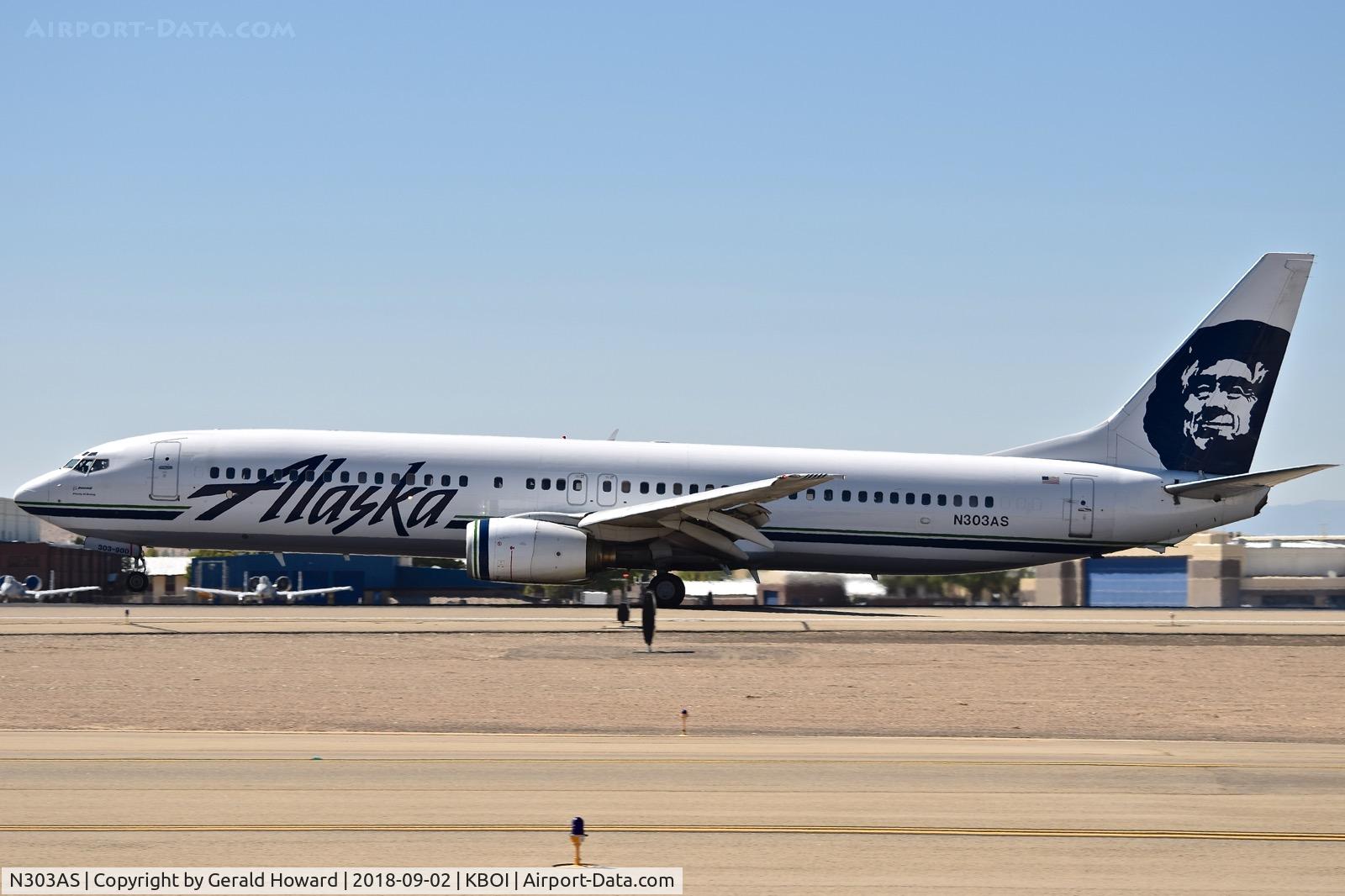 N303AS, 2001 Boeing 737-990 C/N 30016, Landing roll out on RWY 10L.