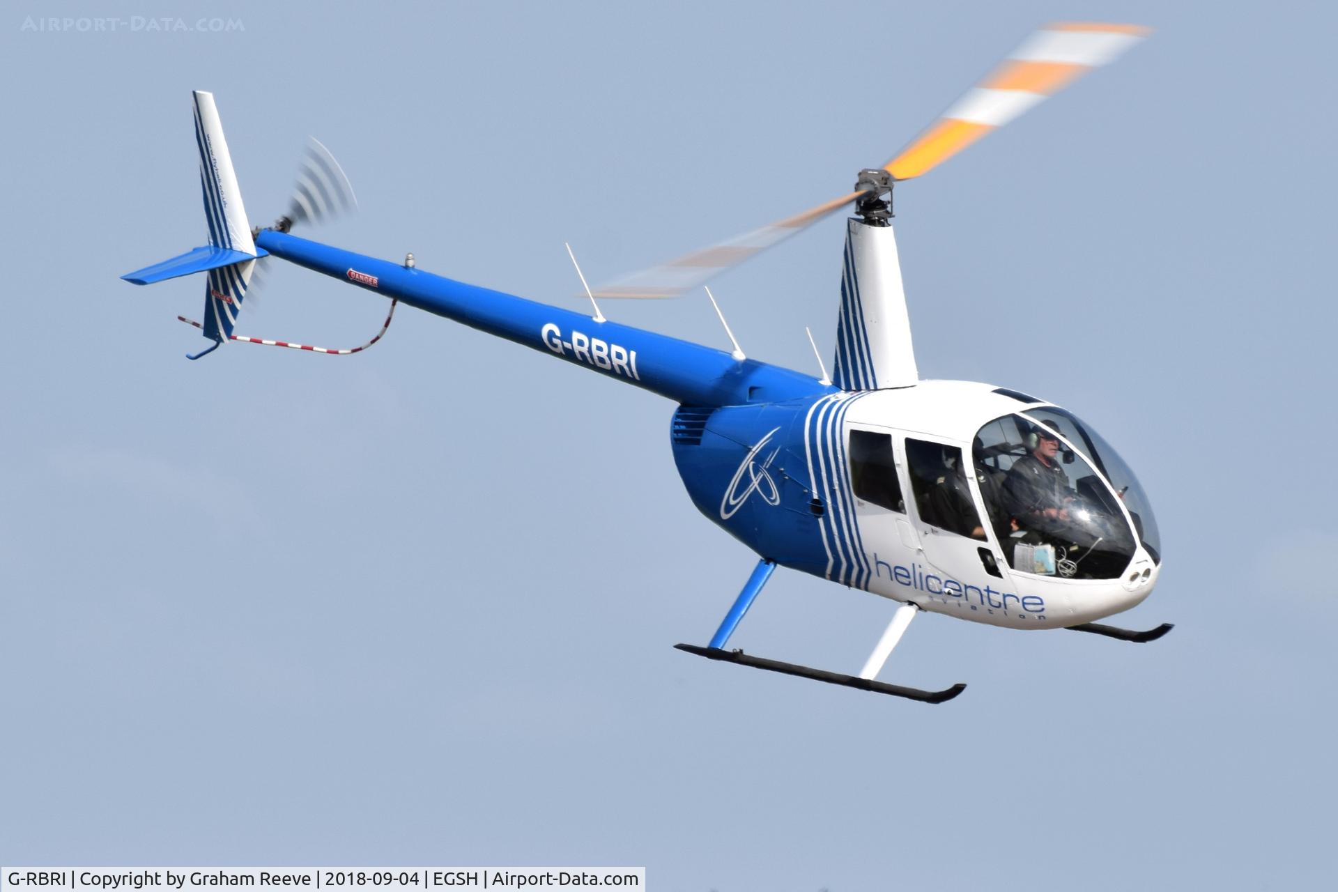 G-RBRI, 2007 Robinson R44 Raven II C/N 11963, Landing at Norwich.