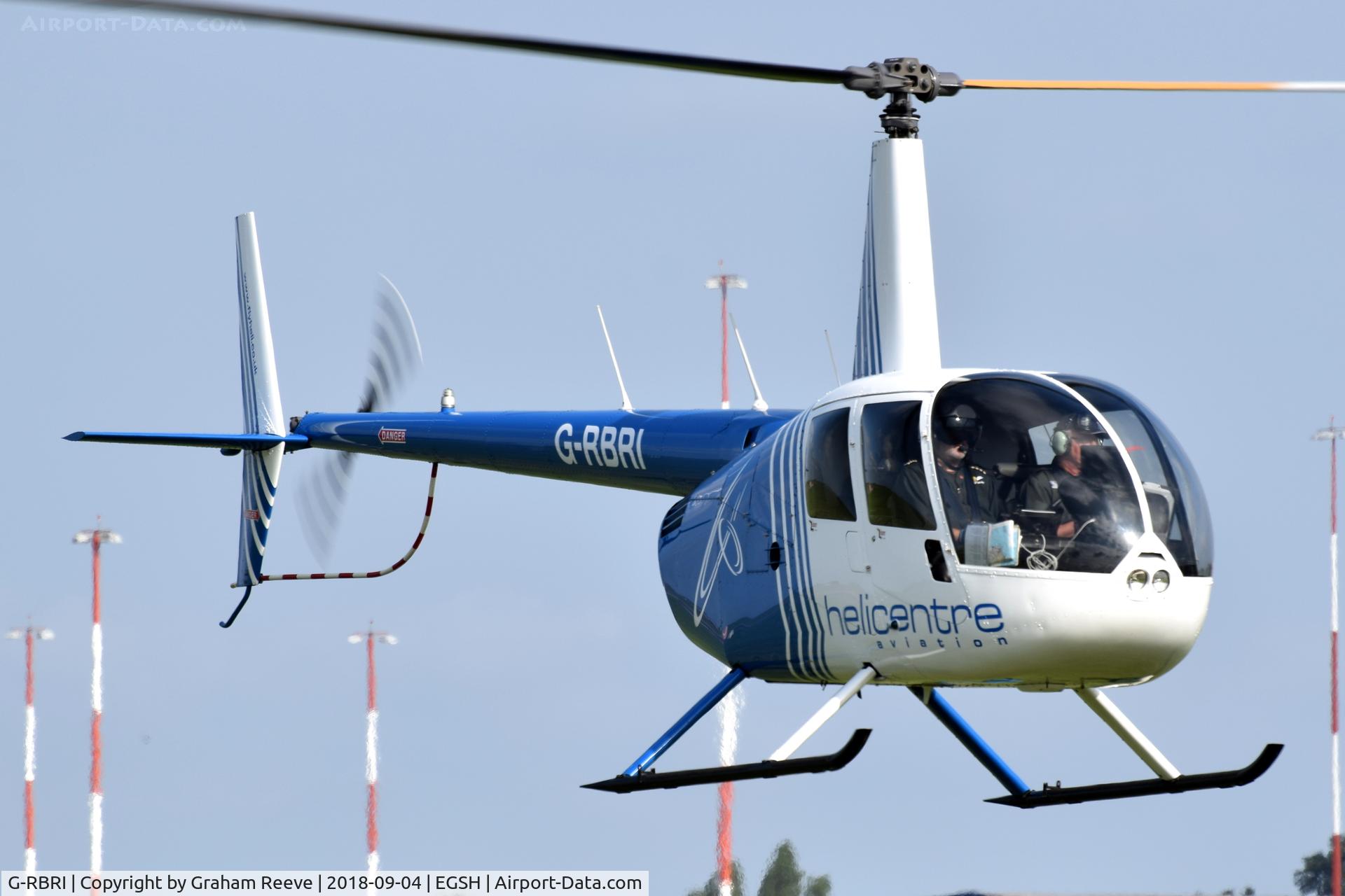 G-RBRI, 2007 Robinson R44 Raven II C/N 11963, Landing at Norwich.