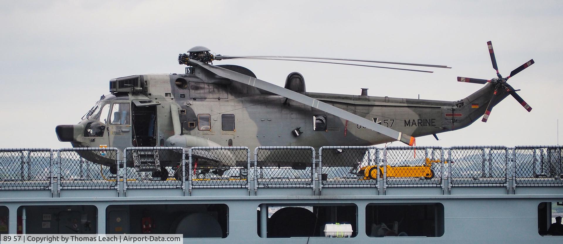 89 57, Westland Sea King Mk.41 C/N WA761/83, German Sea Kings 89+57 On the Flight deck of FGS Bonn heading into Devonport Dockyard Plymouth,UK