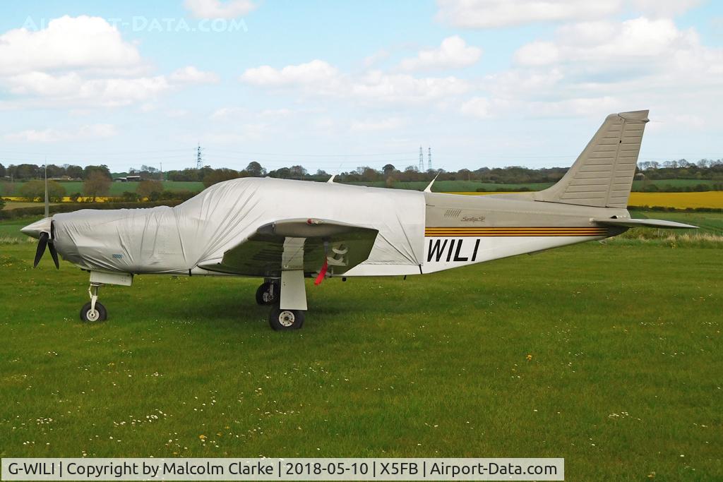G-WILI, 1987 Piper PA-32R-301 Saratoga SP C/N 3213004, Piper PA-32R-301 Saratoga SP wrapped up awaiting the attention of the engineering and paint facility at Fishburn Airfield, UK. May 10th 2018