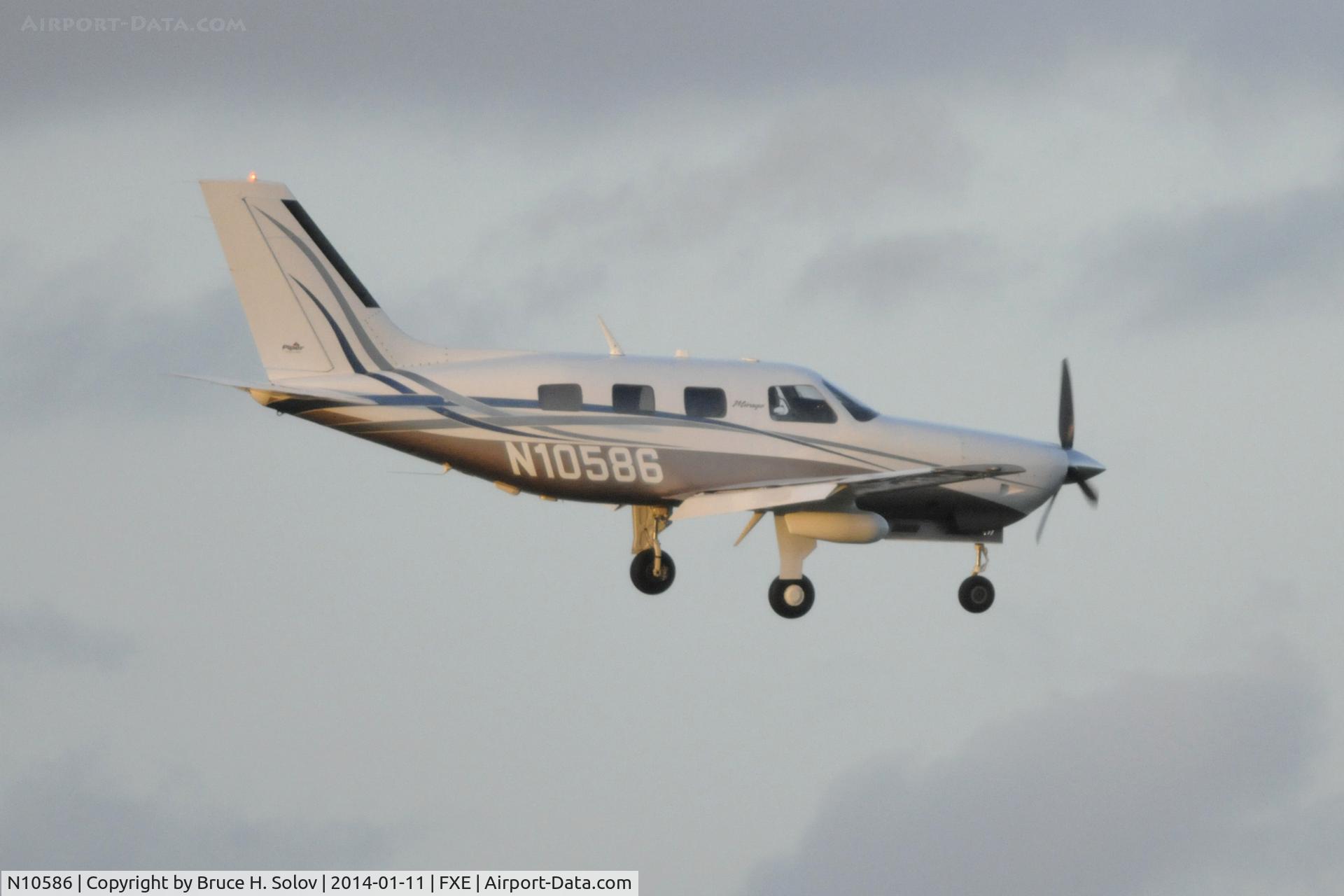 N10586, 1953 Beech A45 C/N 34-115, on approach to FXE