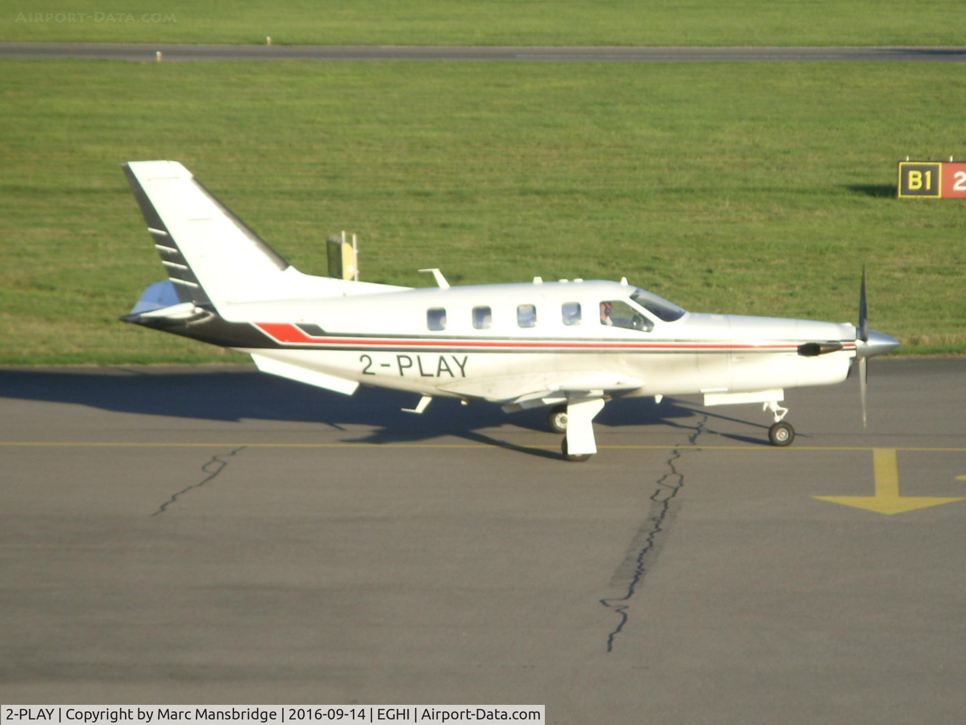 2-PLAY, 2004 Socata TBM-700 C/N 302, Taxiing for departure at Southampton airport EGHI. Photo taken from the multistory carpark