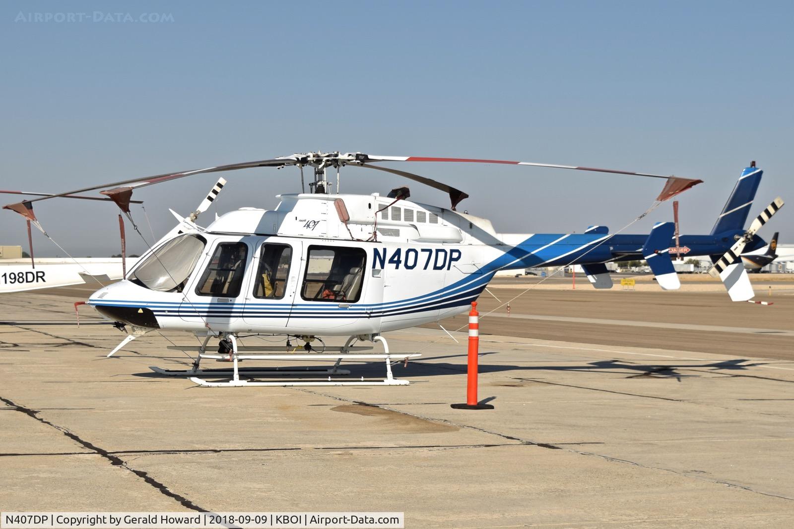 N407DP, 1997 Bell 407 C/N 53099, Parked on the south GA ramp.