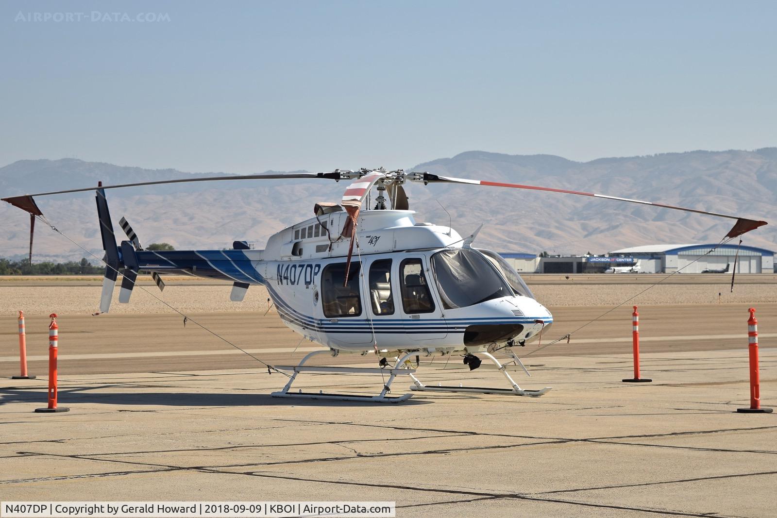 N407DP, 1997 Bell 407 C/N 53099, Parked on the south GA ramp.