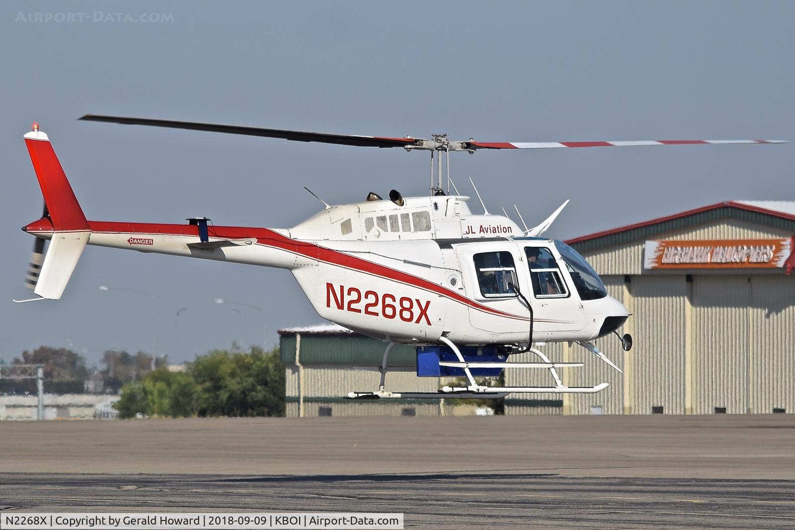 N2268X, Bell 206B JetRanger III C/N 3607, Lifting off from the north GA ramp.