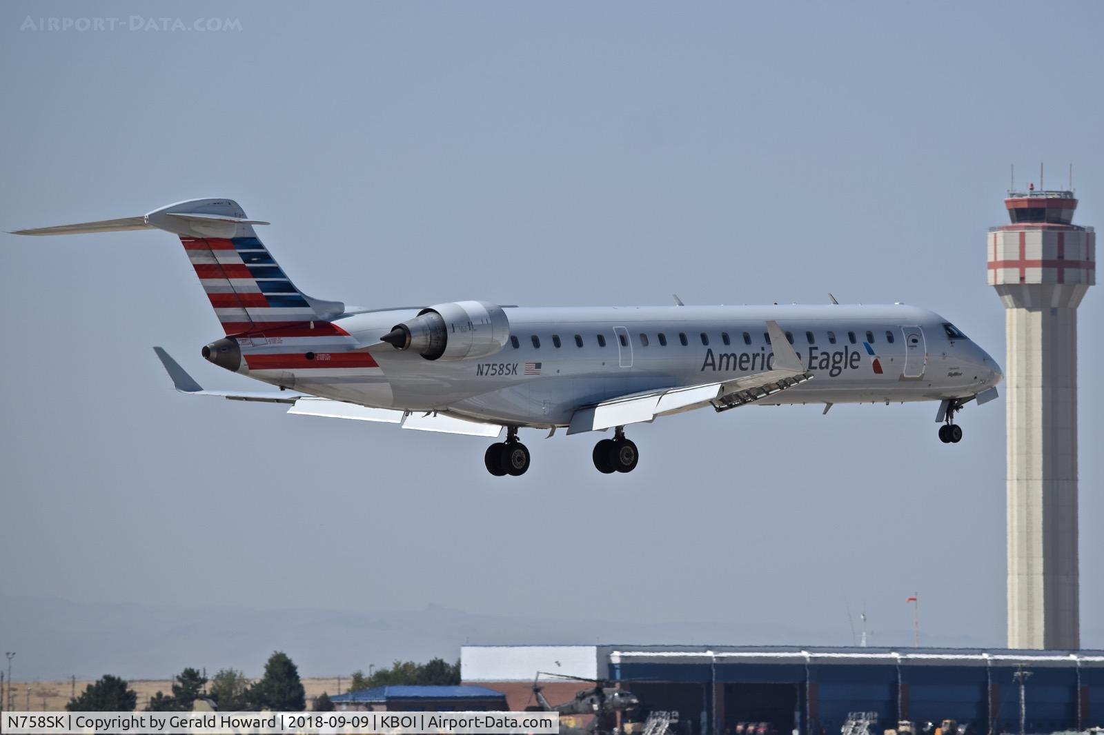 N758SK, 2005 Bombardier CRJ-701ER (CL-600-2C10) Regional Jet C/N 10222, Landing RWY 28R.