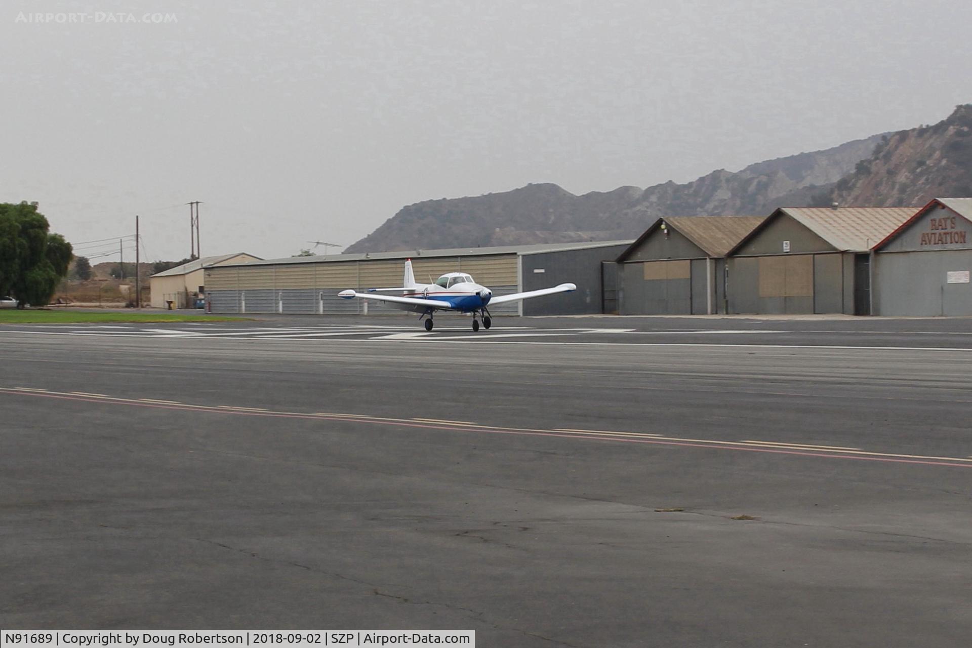 N91689, 1946 North American Navion (NA-145) C/N NAV-4-431, 1946 North American NAVION, Continental E225 upgrade, arrival landing roll Rwy 22. Will give Young Eagles rides today.